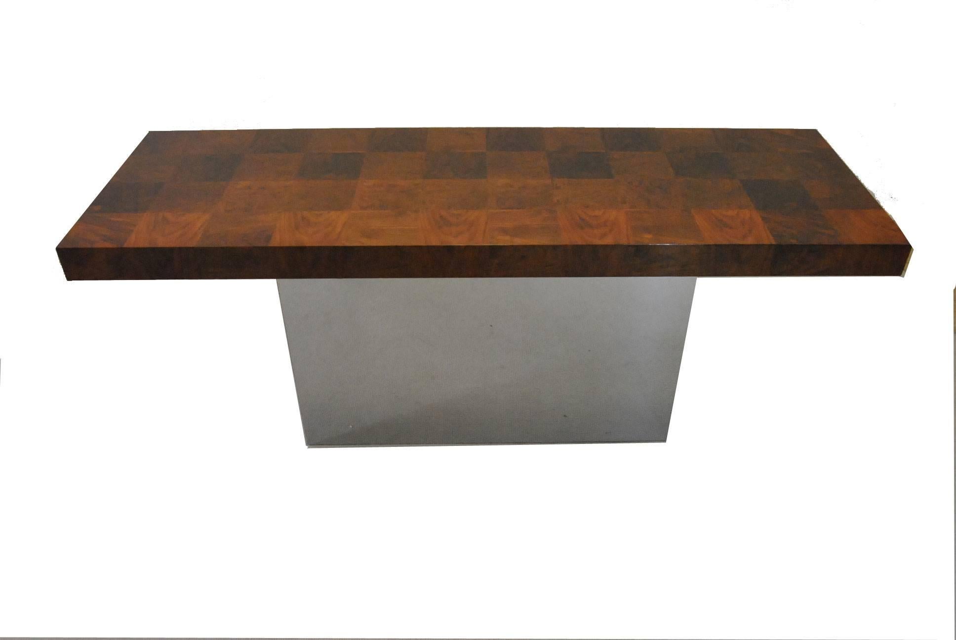 An unusual Mid-Century console table designed by Milo Baughman for Thayer Coggin. This table is circa 1970's and features a walnut parquetry patchwork top with original finish. The base is polished chrome in a rectangular shape. Great, clean lines