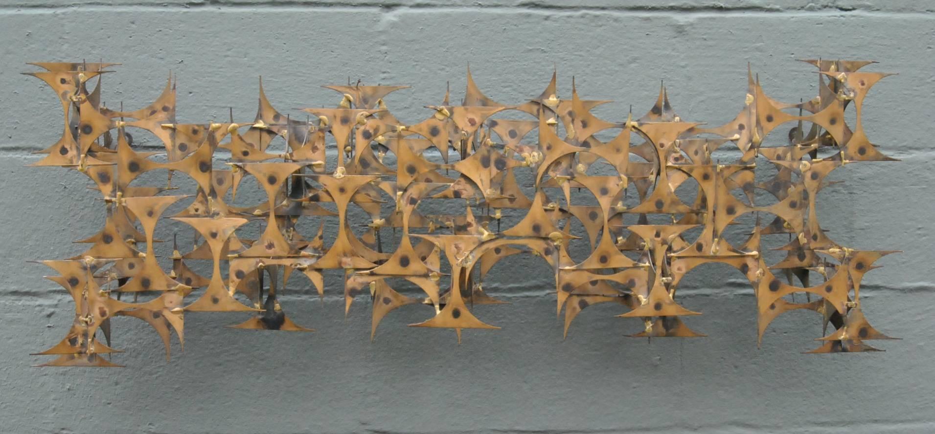 A mid century wall sculpture 