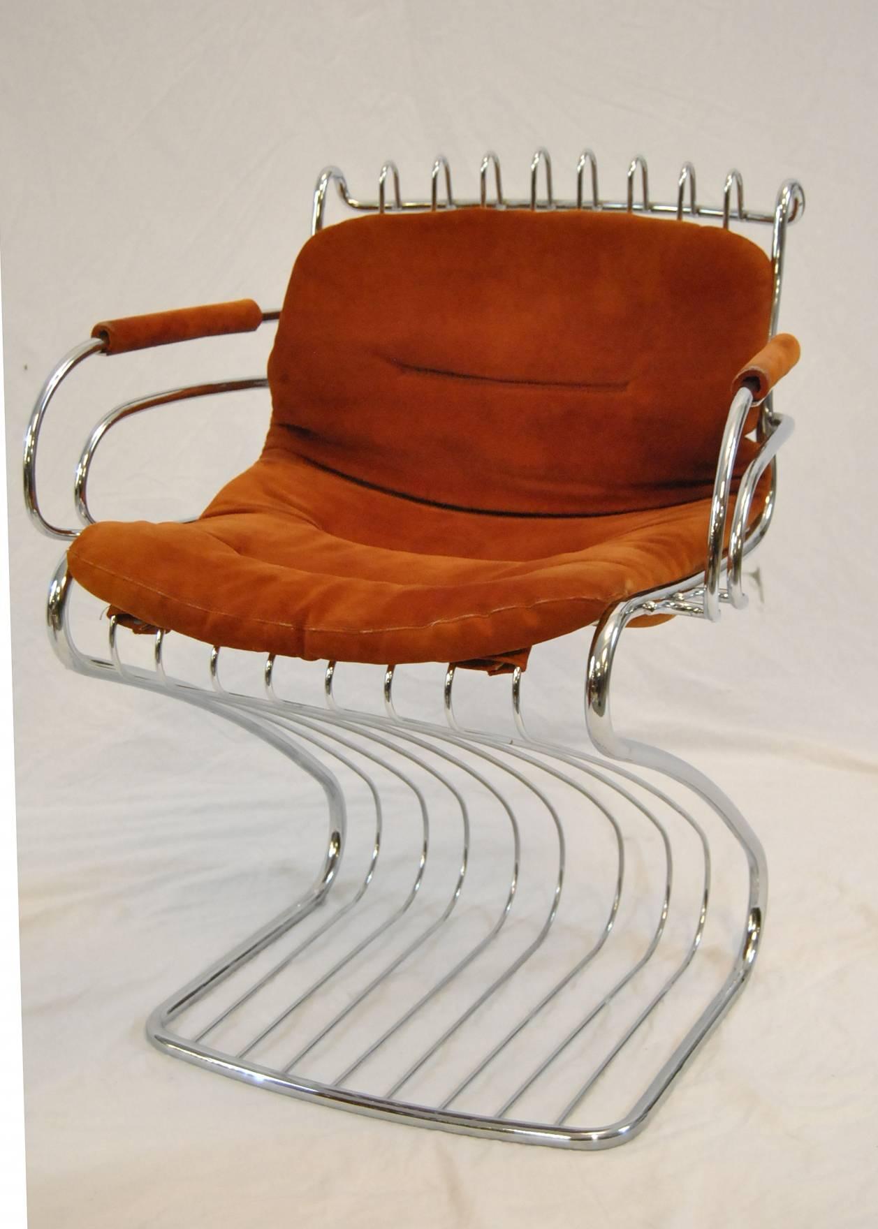 A great set of Mid-Century Modern chrome wire chairs designed by Gastone Rinaldi for RIMA of Italy. The set includes six dining chairs, two (2) arm and four (4) side chairs. The chairs are constructed of chromed steel tubing with sculpted wire seats