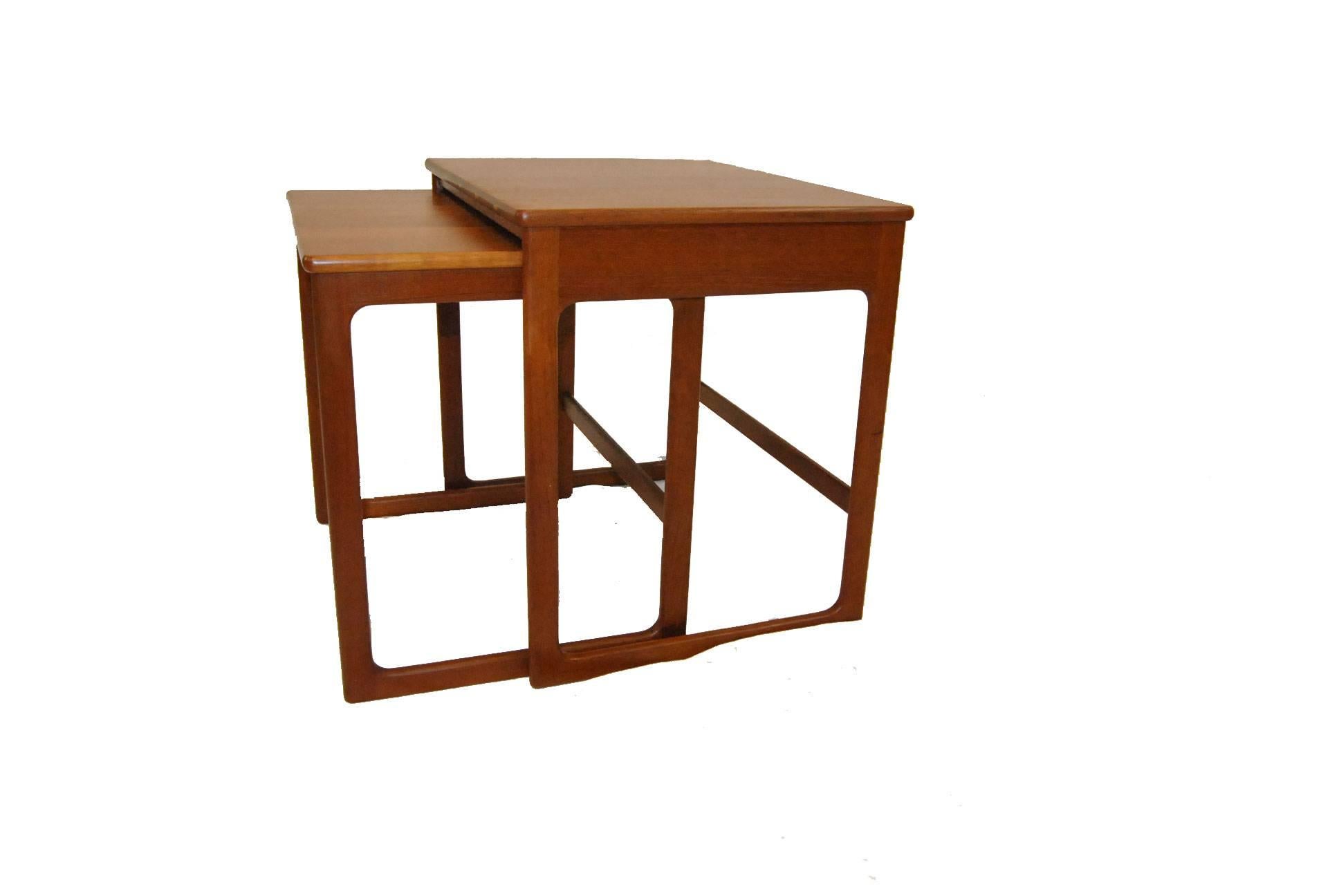 A vintage set of Mid-Century Modern teak nesting tables by A.B. Seffle Møbelfabrik designed by Yngvar Sandstrom. Made in Sweden. Signed on the bottom. Compact, solid, sturdy, beautiful and useful, perfect for your Mid-Century decor. Very good
