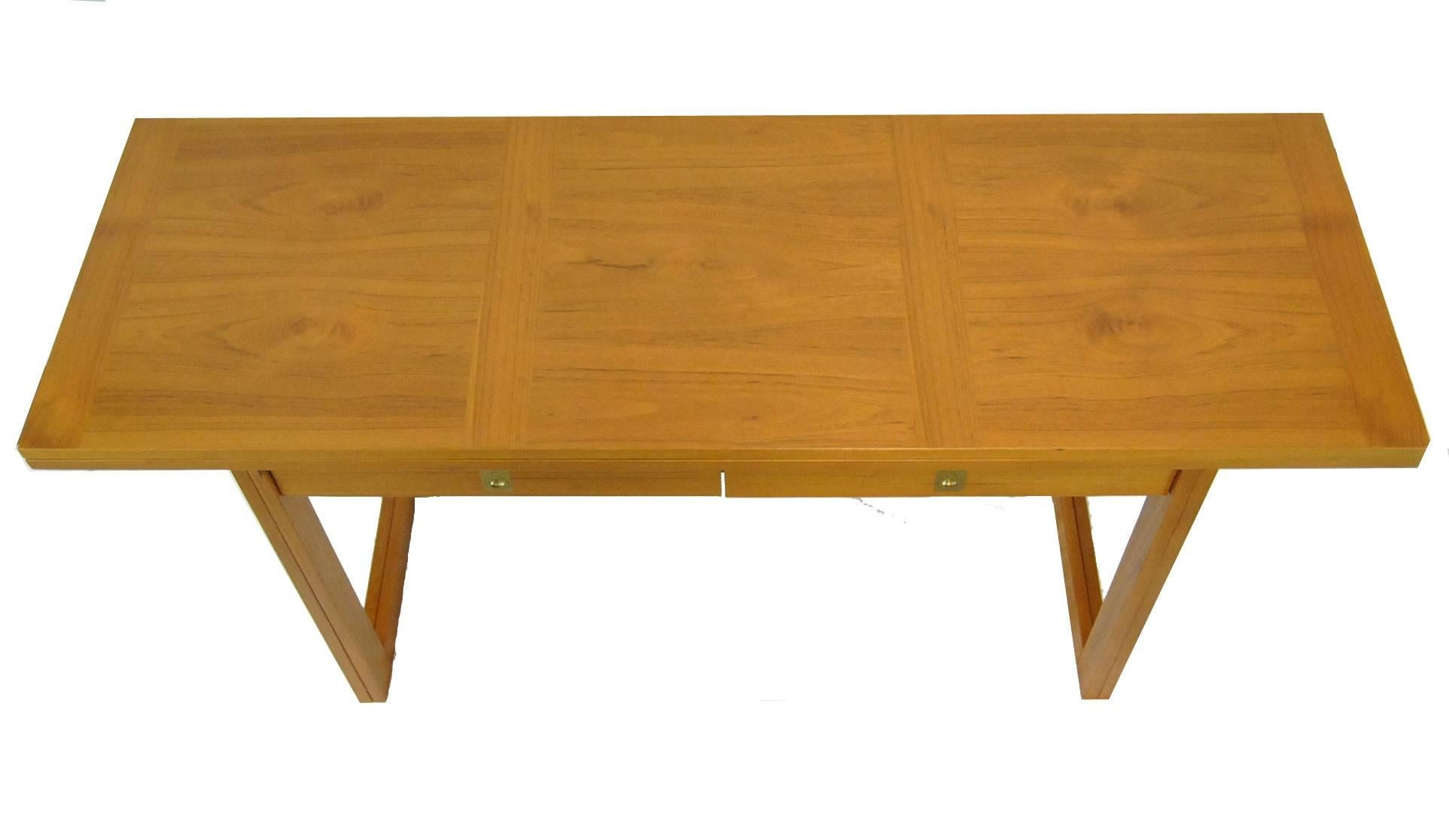 This is a great Danish table for areas with space constraints. The desk with two dovetailed drawers is only 69