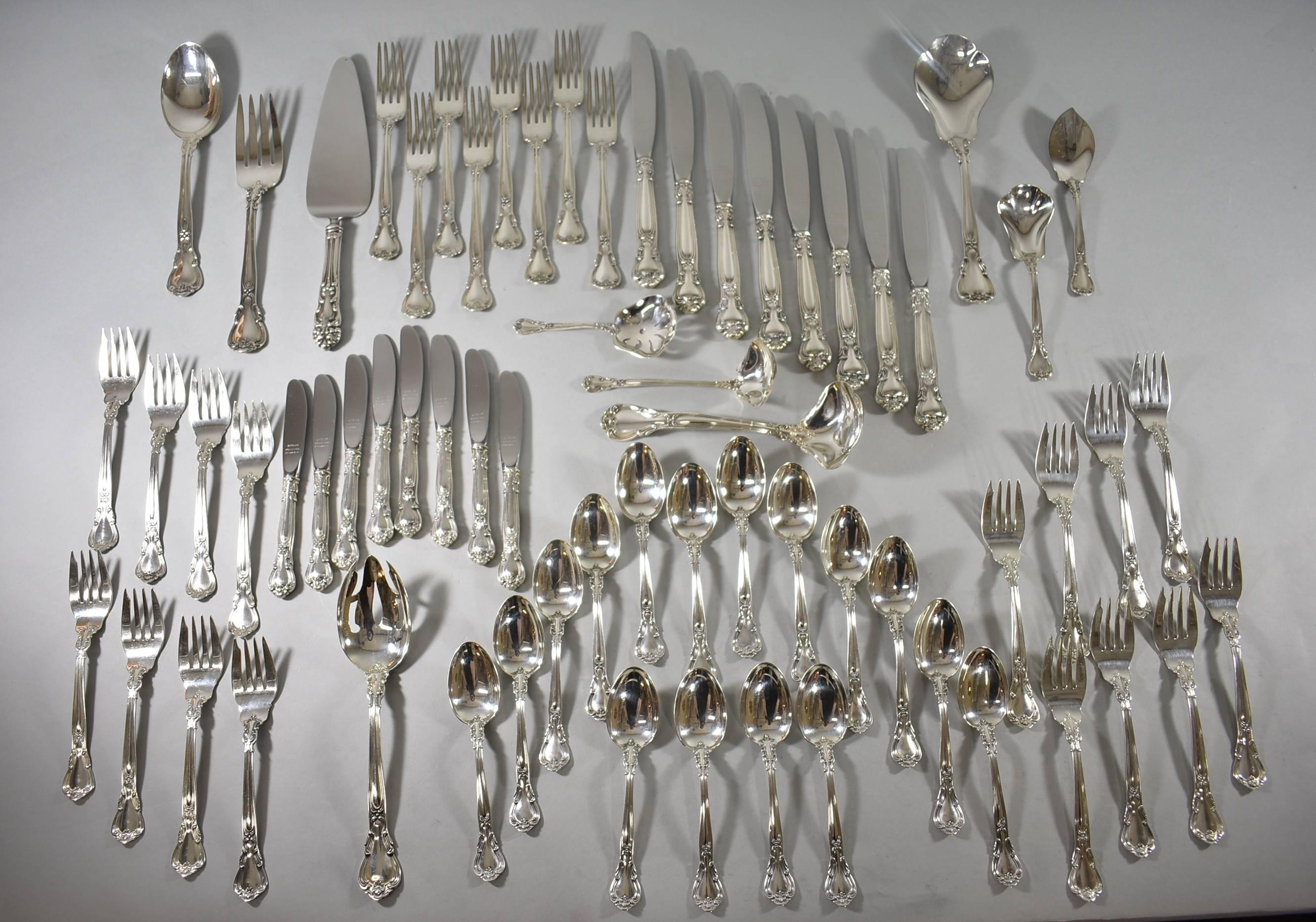 A beautiful set of sterling silver flatware by Gorham, Chantilly pattern. The set includes: (16) 6.5" salad forks, 37.8 g; (16) 6.25" butter knifes, 38.6 g; (8) 9 1/8" dinner knives; (8) 7.5" dinner forks, 50.5 g; (16) 5.75"