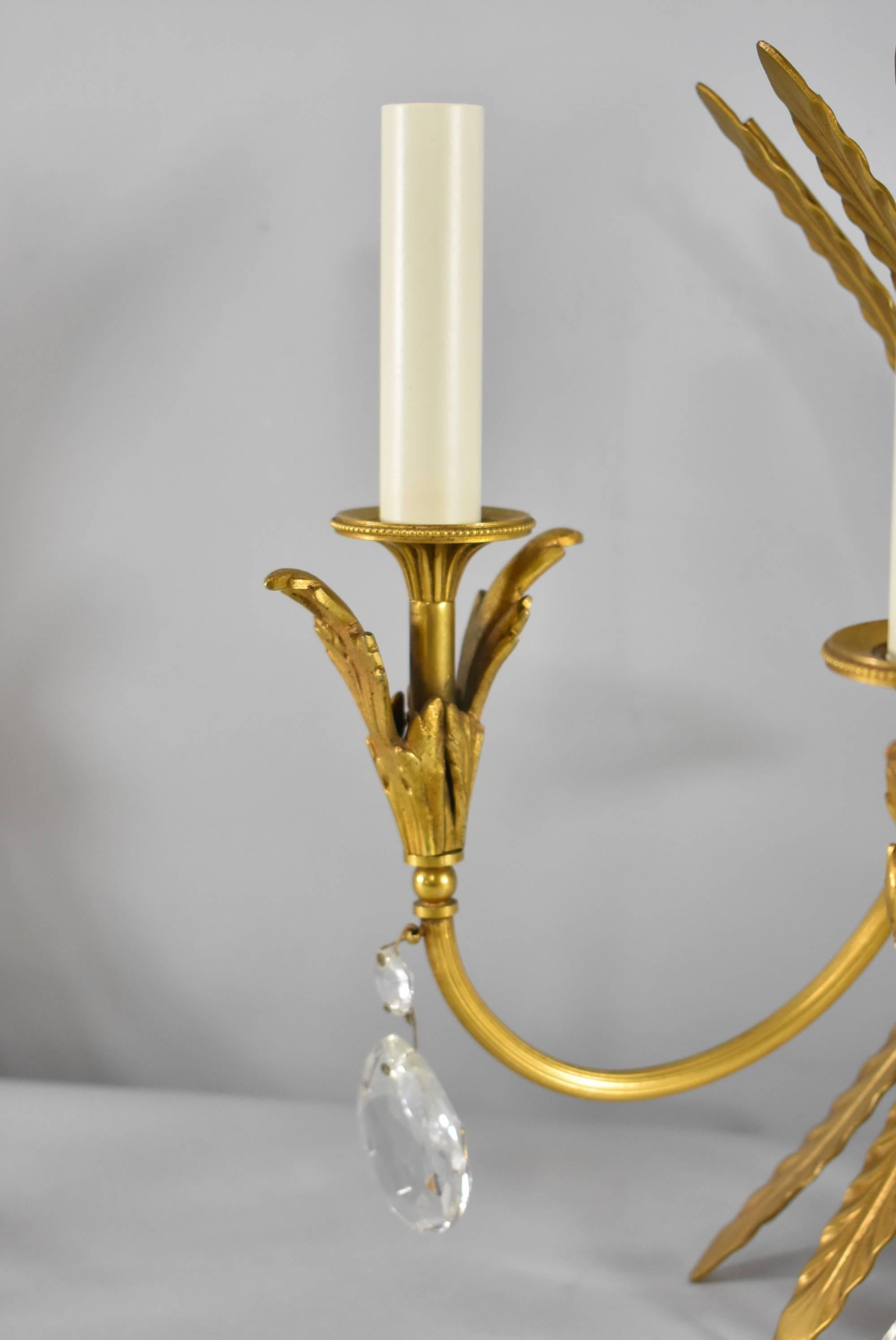 Pair of Italian Neoclassic Style Three-Arm Brass Wall Sconces In Good Condition In Toledo, OH