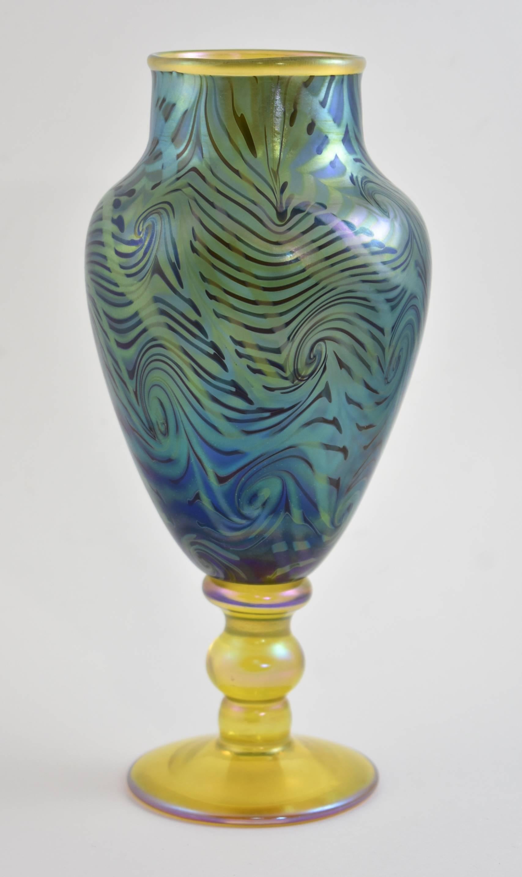 A unique footed vase by LCT Tiffany. Vase is 9