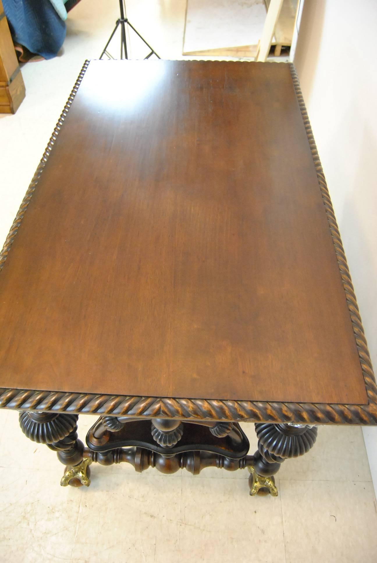 19th Century Antique Mahogany Library Table with Mythical Male Figure and Rope Twist Detail