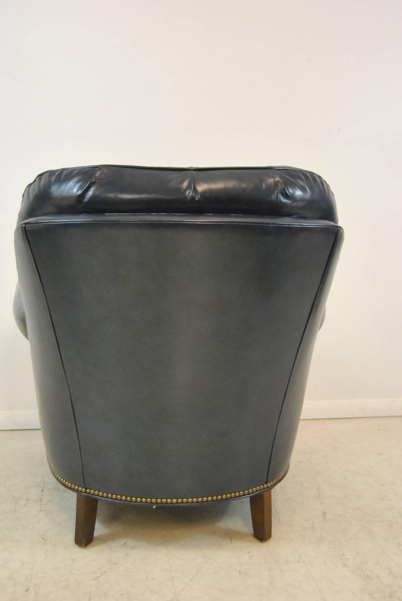 blue leather chair with ottoman