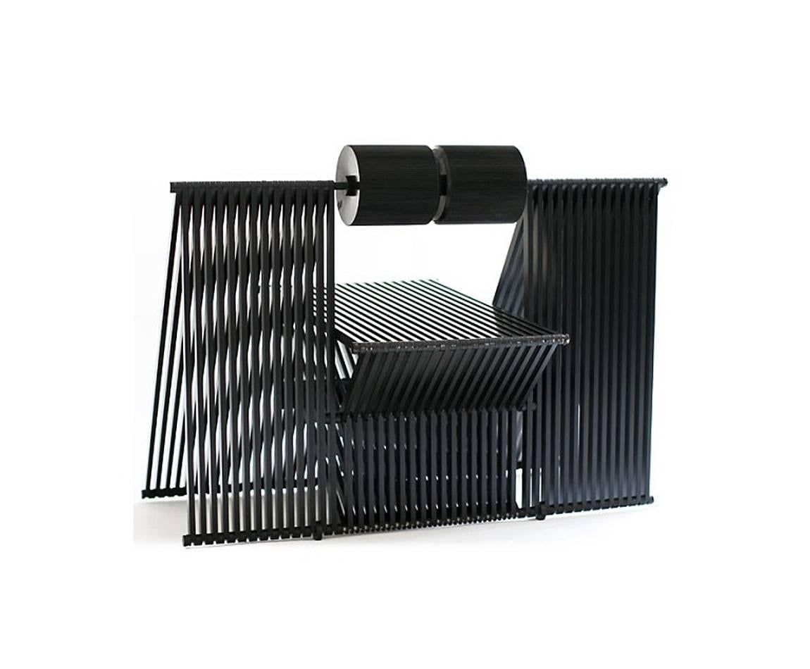 Chair 'Quarta'. Design by Mario Botta (1984). Manufactured by Alias, Italy. Black lacquered aluminium, black rubber. Measures: D 65.0 cm / W 98.0 cm / H 67.0 cm.