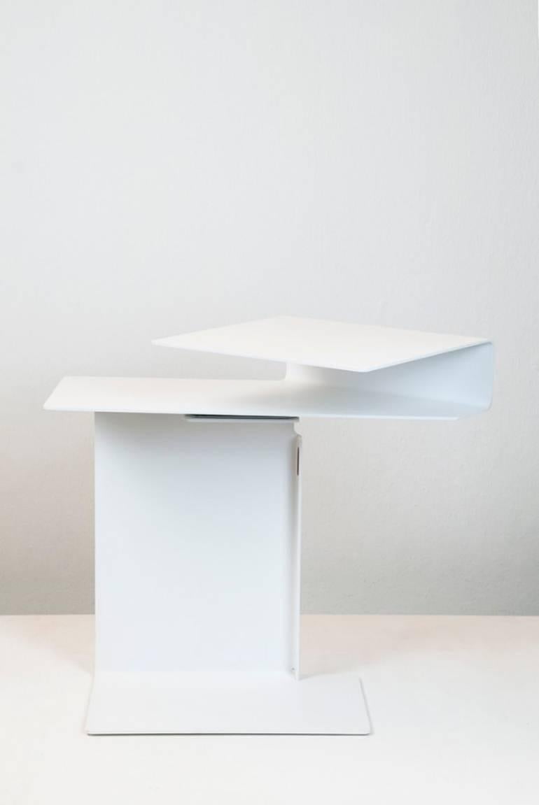 Side table with turntable top 'Diana E.'
Design by Konstantin Grcic (2002).
Manufactured by ClassiCon, Germany.
Powder-coated and bent steel sheet.
Measures: W 66.0 cm / D 40.0 cm / H 54.0 cm.