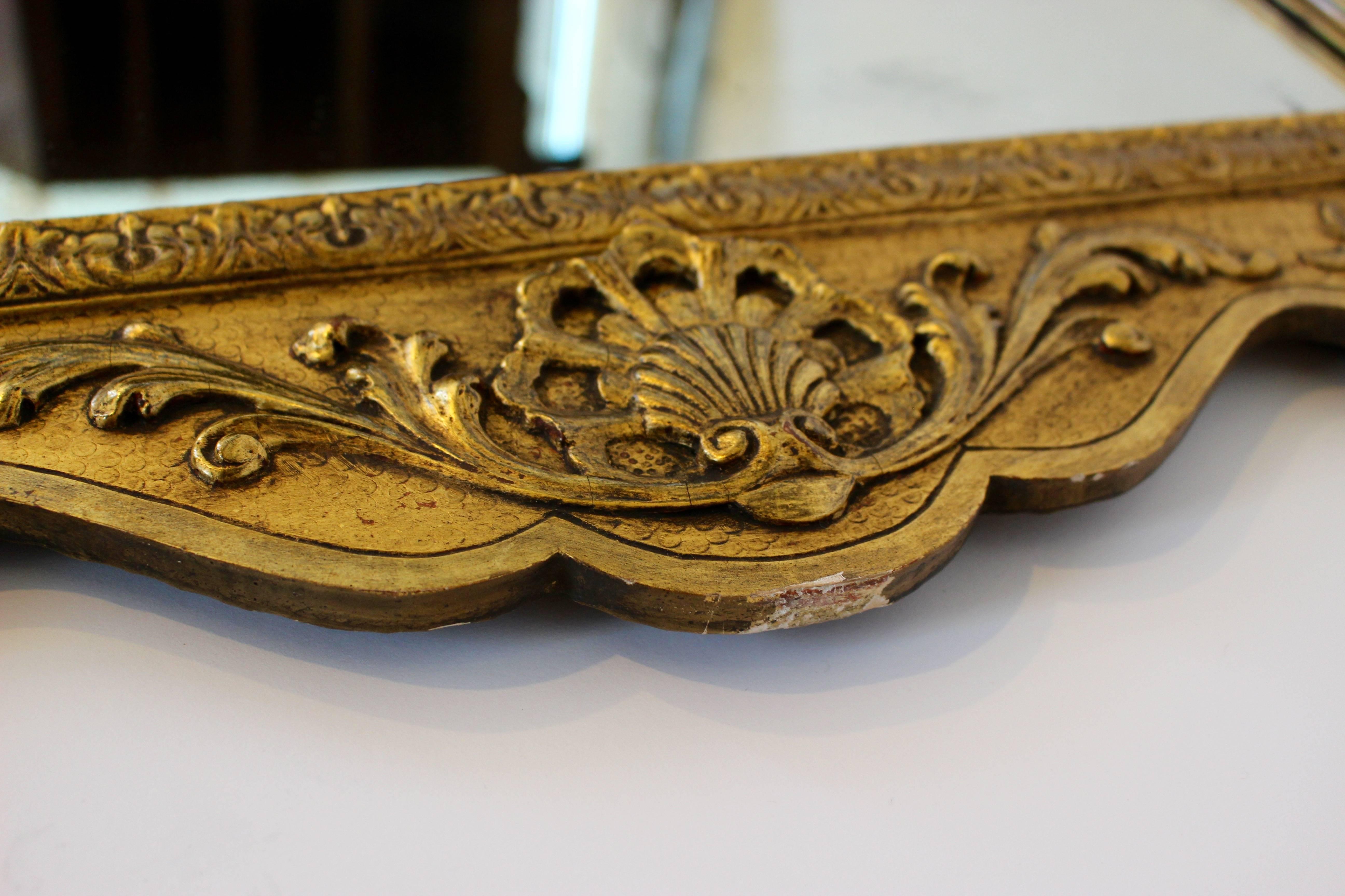 18th Century George I Gilt Gesso Pier Mirror with Swan's Neck Pediment and Carved Decoration For Sale