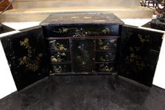 Small Chinese Black Lacquered Wood Cabinet with Raised Traditional Scenery
