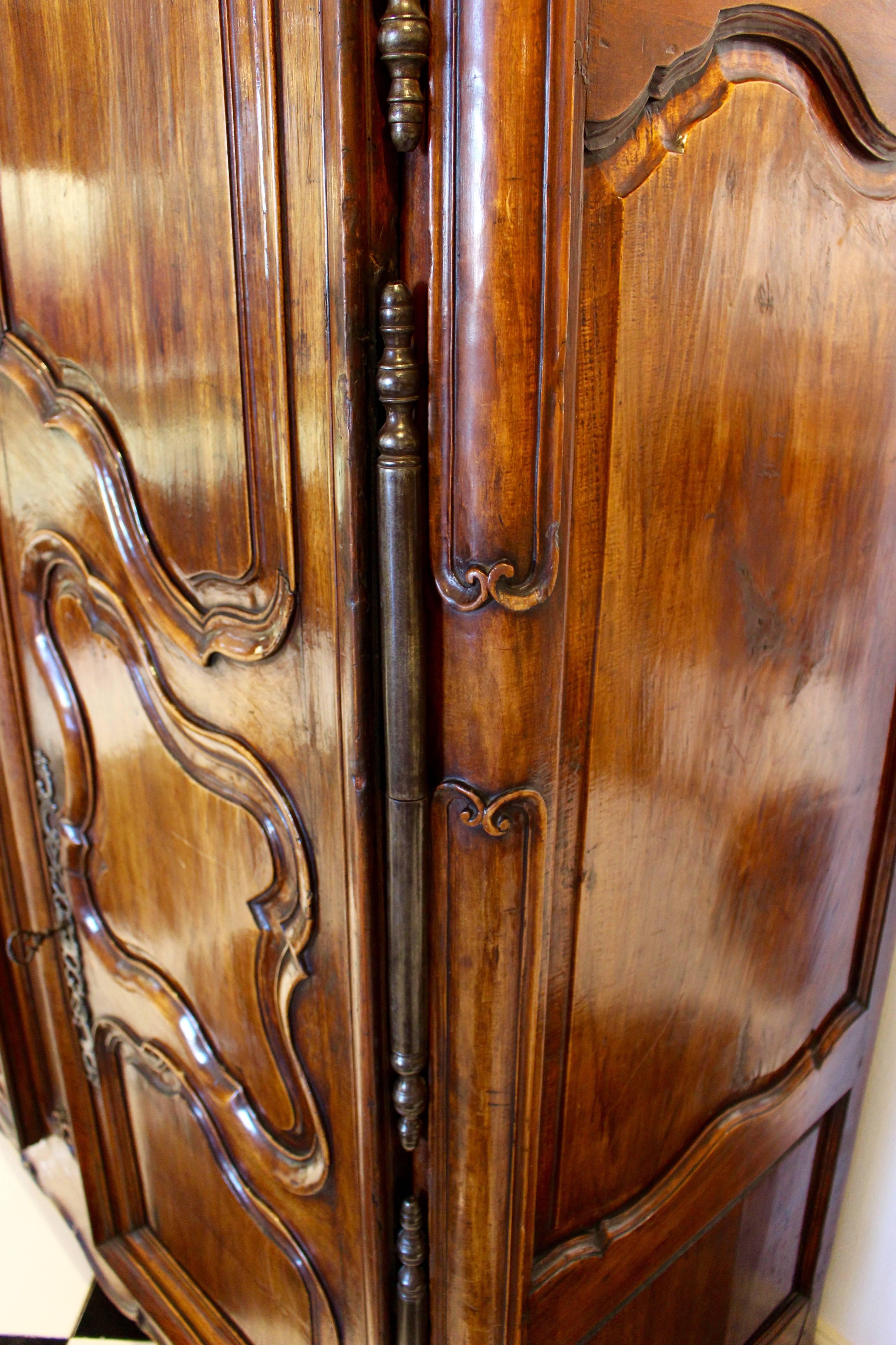 Carved French 1740s Louis XV Period Fruitwood Two-Door Armoire with Raised Panels For Sale