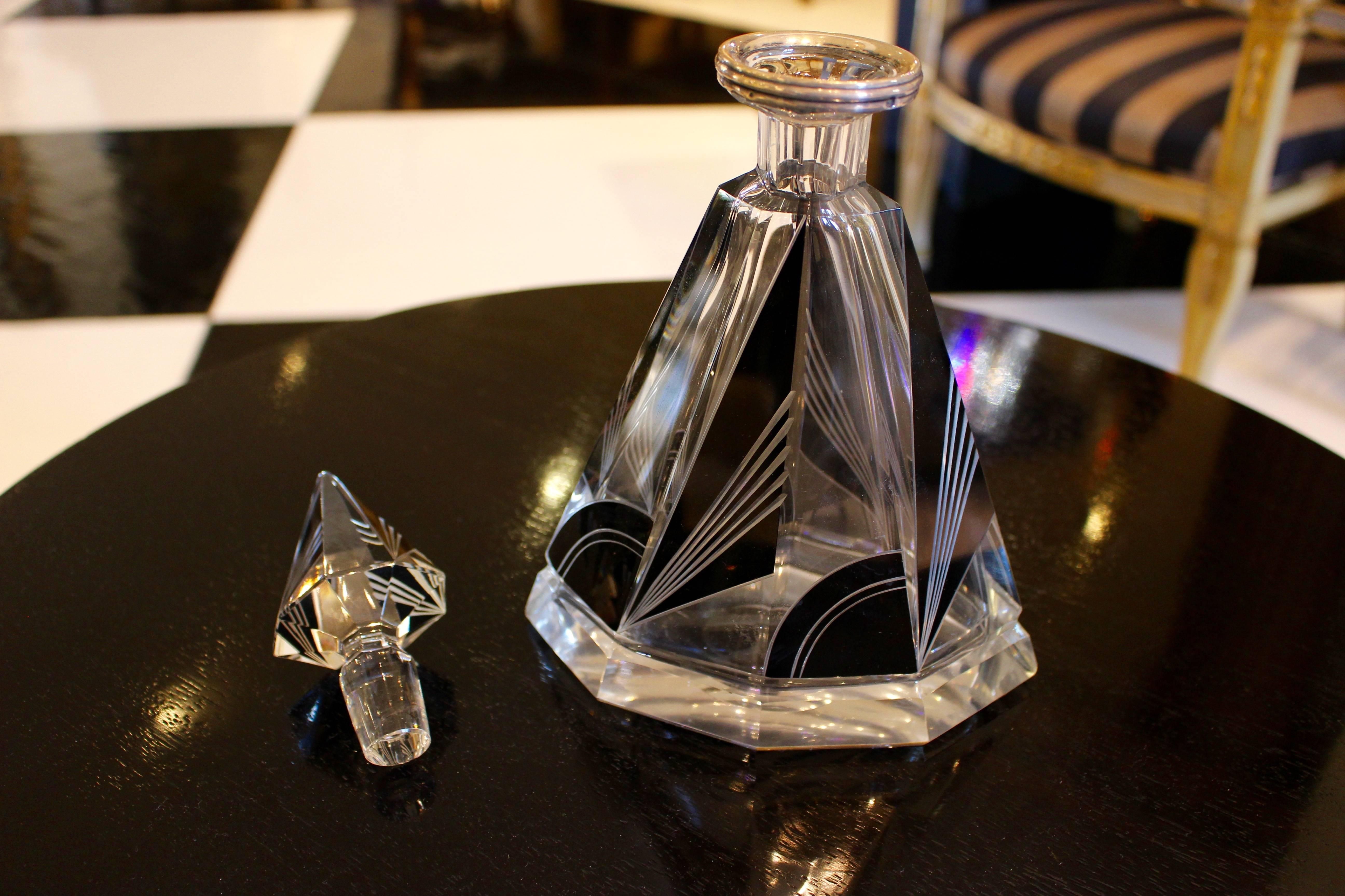 A rare surviving Bohemian crystal and silver decanter, depicts the art style of the Art Deco period.