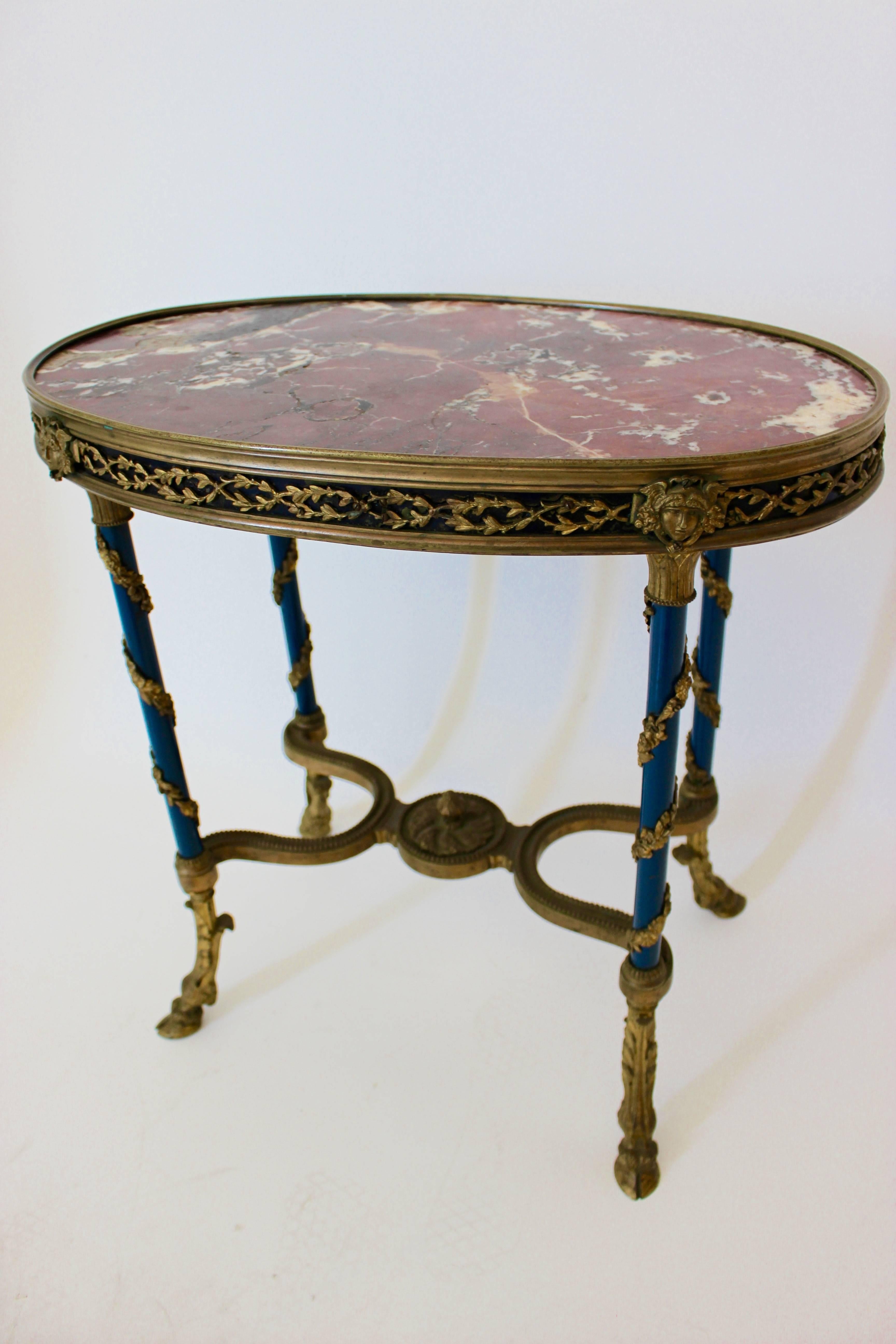 French Gilt Bronze-Mounted and Patinated Metal Oval Low Occasional Table In Excellent Condition In Palm Desert, CA
