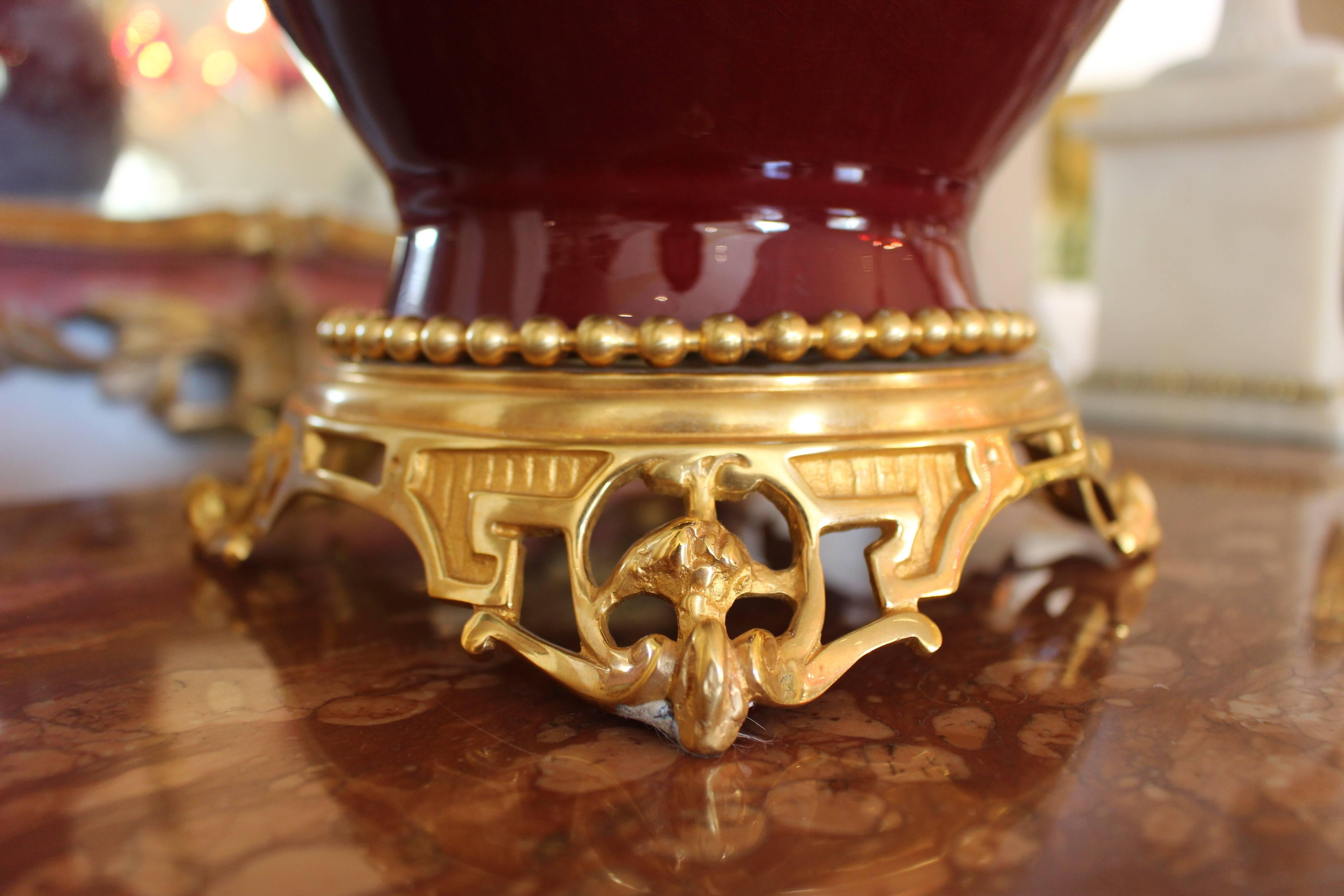 Elegant French ox blood vase mounted in the traditional style with ormolu mounts. Exceptional condition, circa 1850.