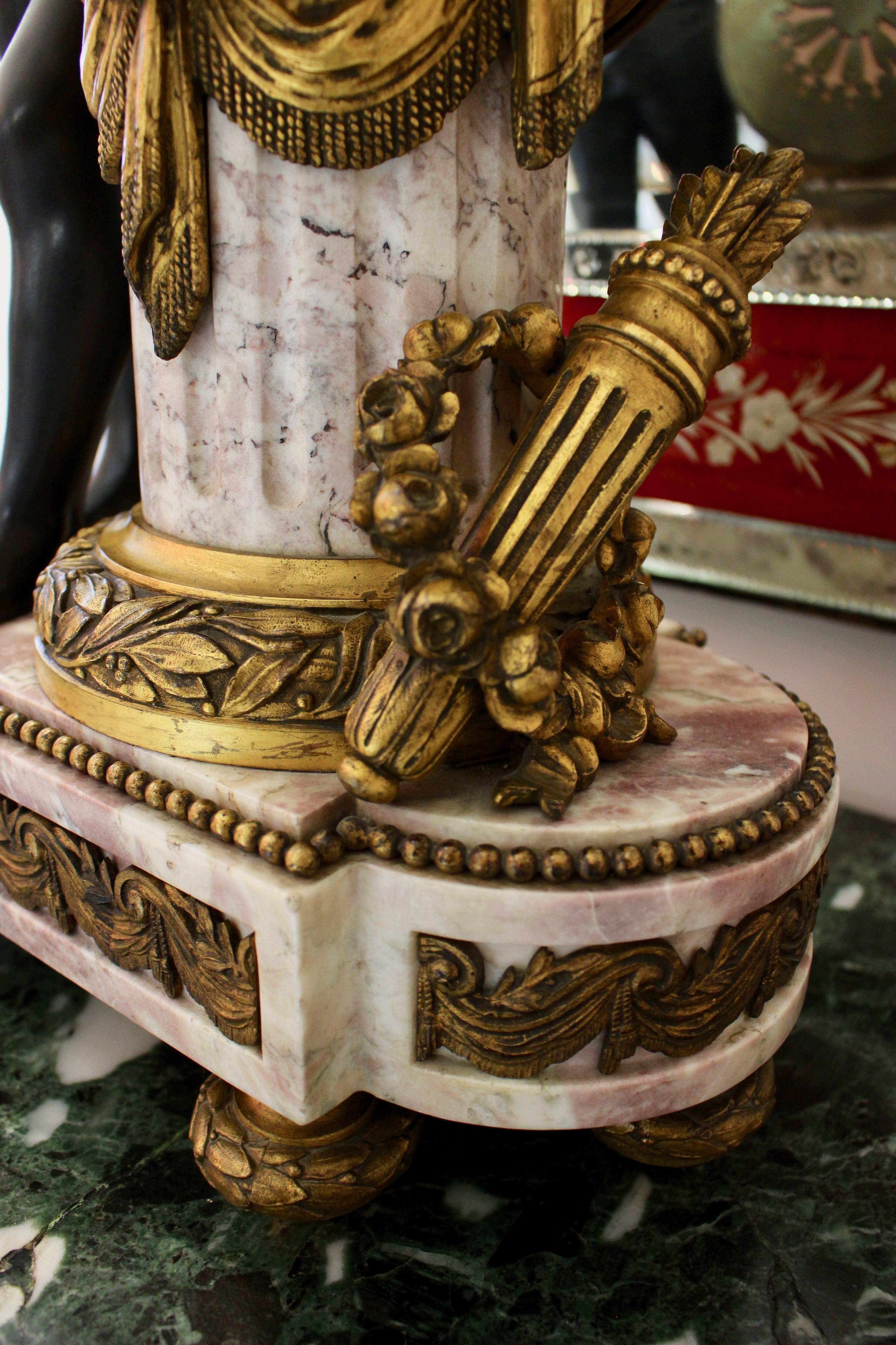 French Louis XVI Period Marble and Gilt-Bronze Mantle Clock with Playful Cupid In Good Condition In Palm Desert, CA