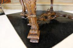 Baroque Style Mid 19th Century Carved Walnut Armchair with Scrolled Motifs