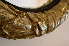 Impressive Regency Giltwood Convex Mirror with a Leaf Motif, Gilded