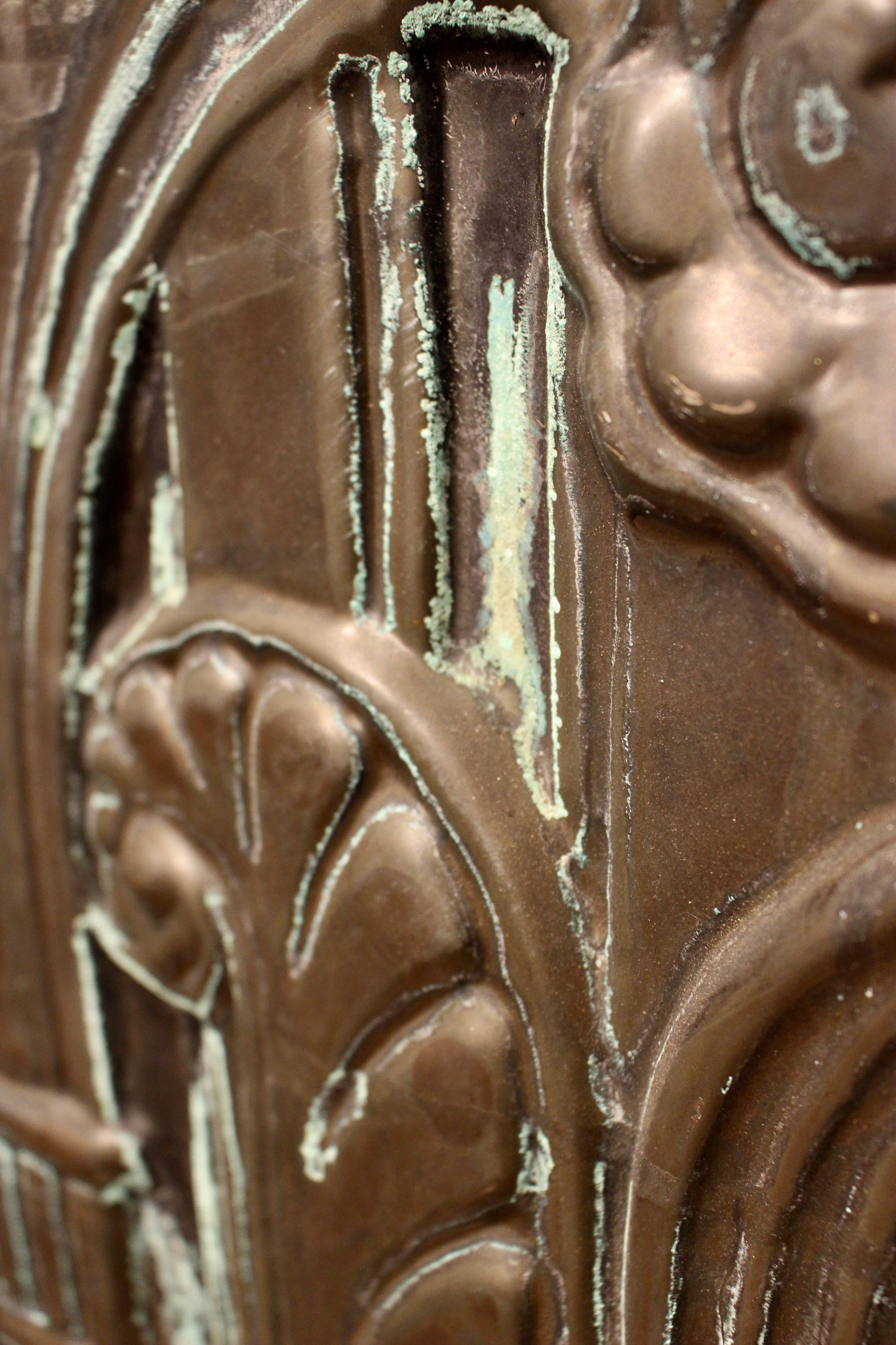 An Art Deco black tin architectural panel which was displayed in New England Power Company offices in Copley Square, Boston. This exquisite architectural panel features the traits typical of the Art Deco period that soared during the 1920s and