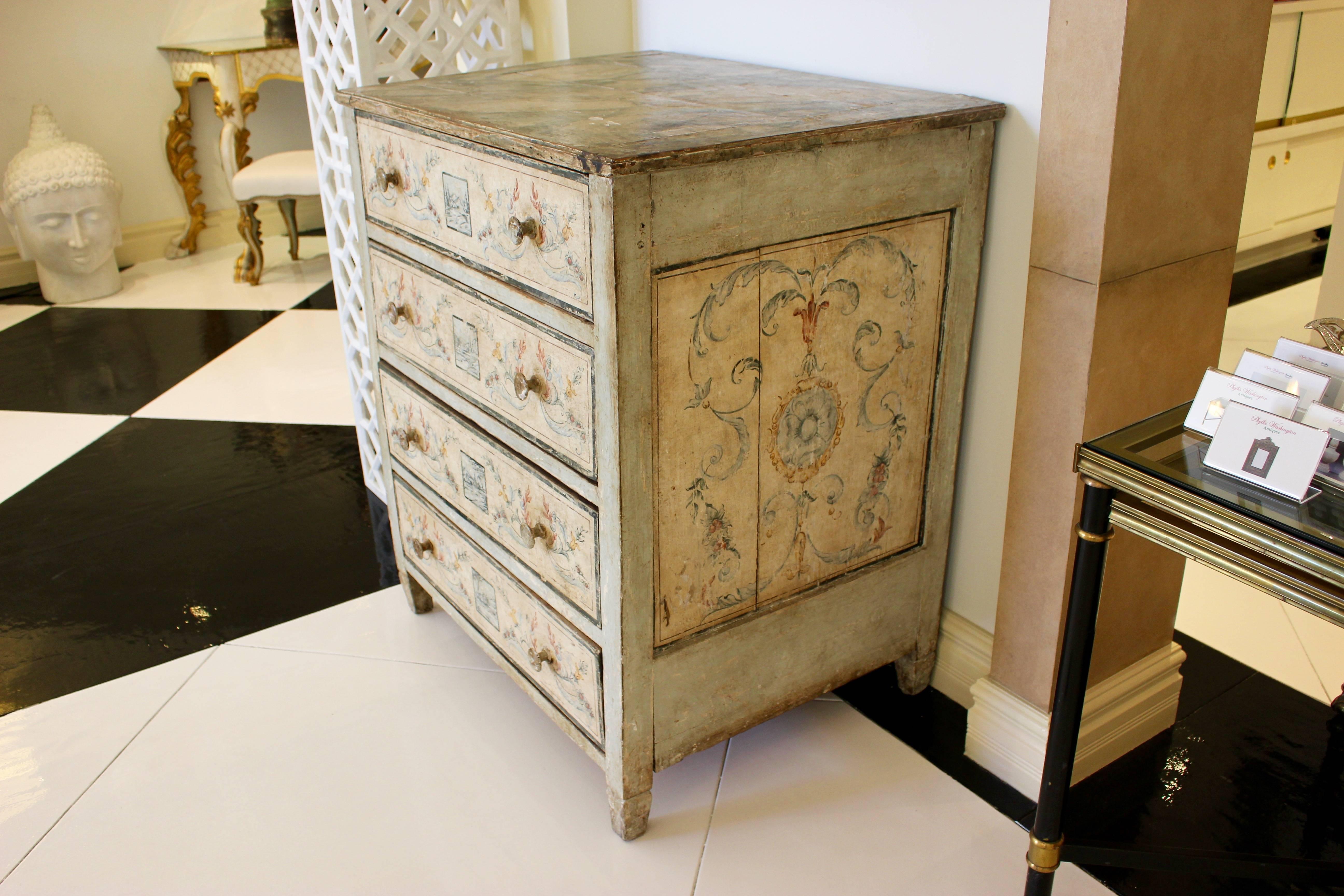 An Italian neoclassical period painted poplar four-drawer commode with hand-painted Pompeian style motifs and faux-marble top. Born in the later years of the 18th century, this exquisite Italian commode witnesses the impact the rediscovery of