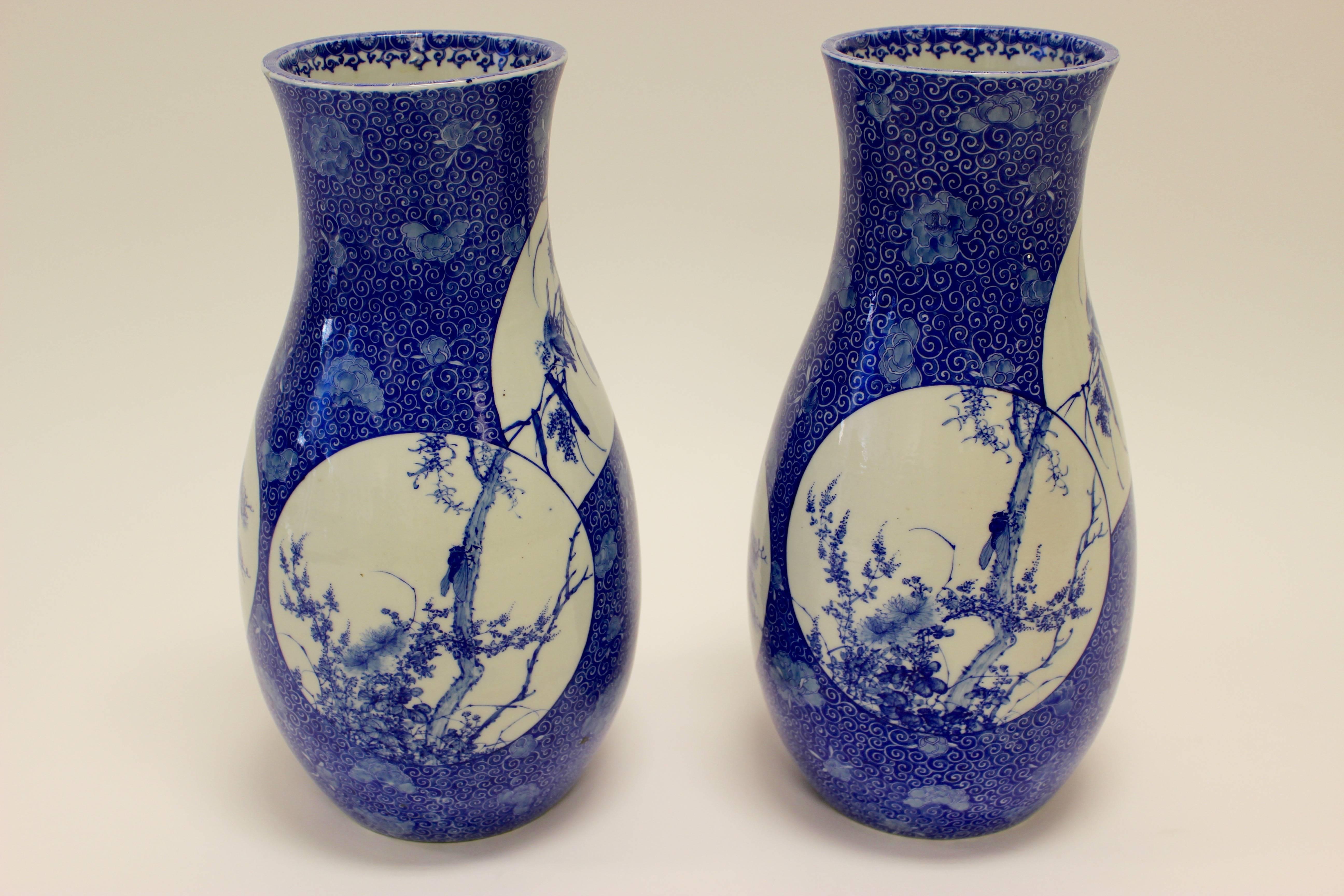 Pair of Japanese Blue and White Baluster Vases with Shaped Panels of Animals In Good Condition For Sale In Palm Desert, CA