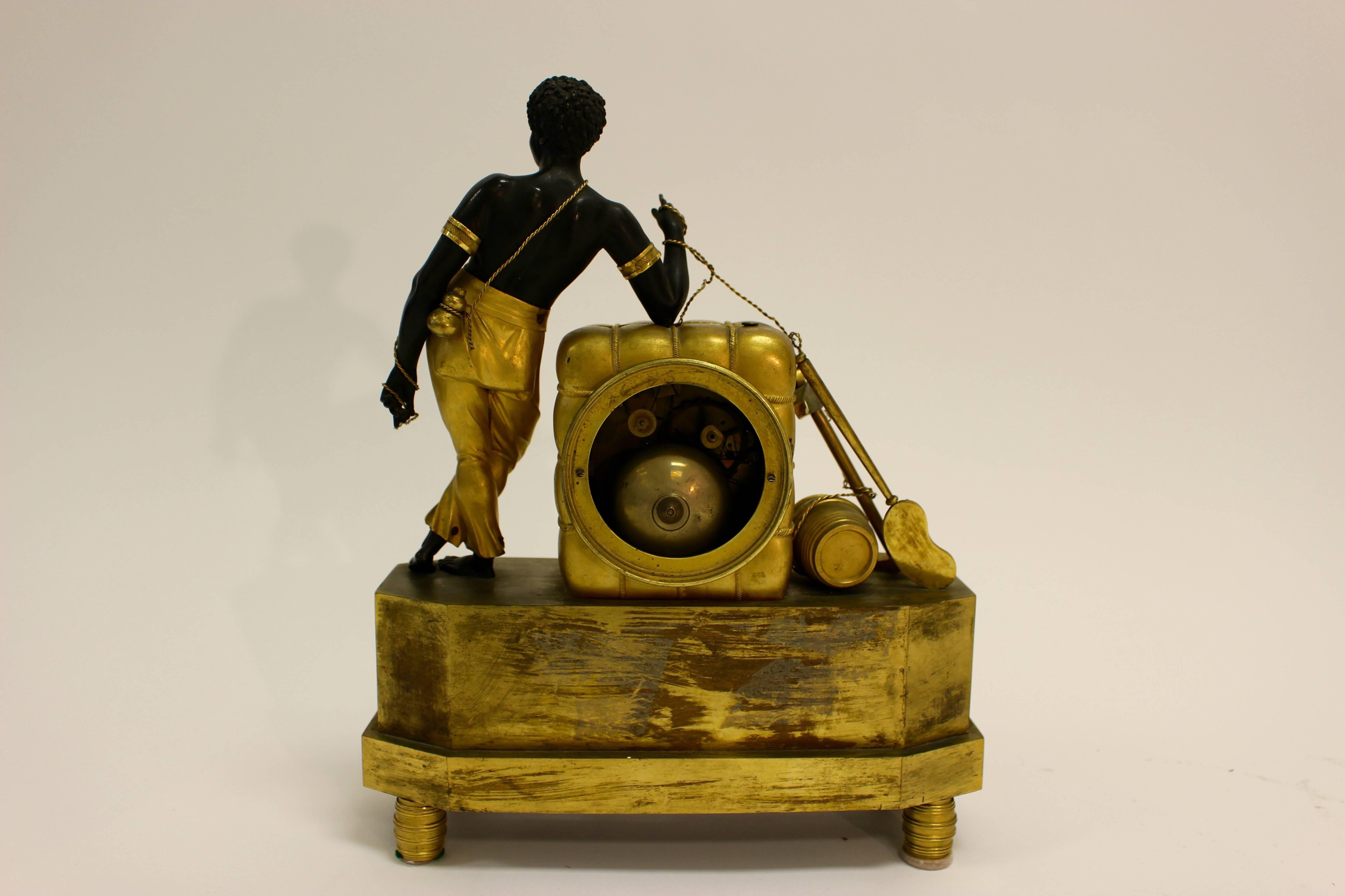 Patinated Empire 19th Century Ormolu and Painted Bronze Mantel Clock with Young Sailor For Sale