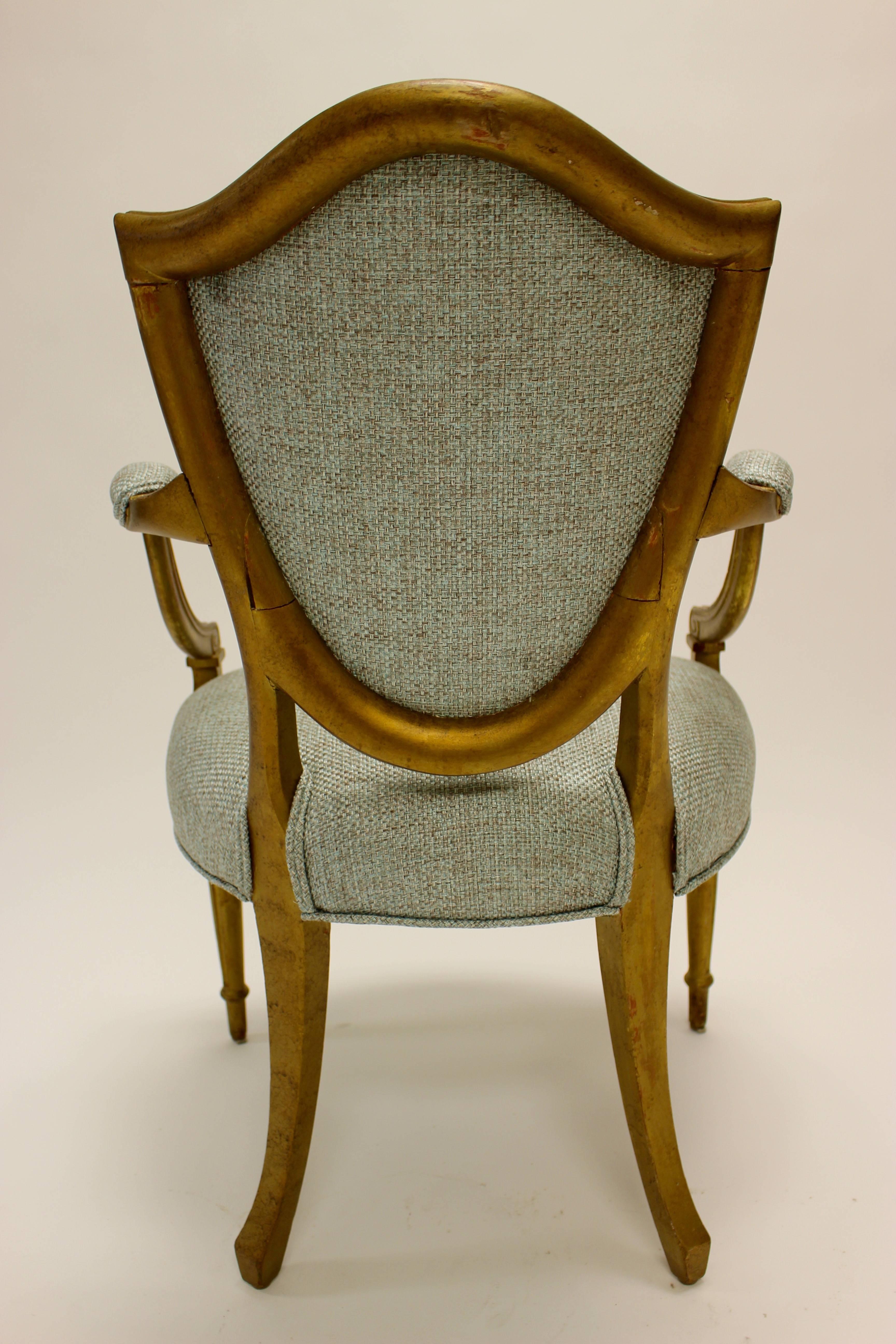 Carved 19th Century Hepplewhite Style Shield-Back Parcel-Gilt Armchair with Open Arms