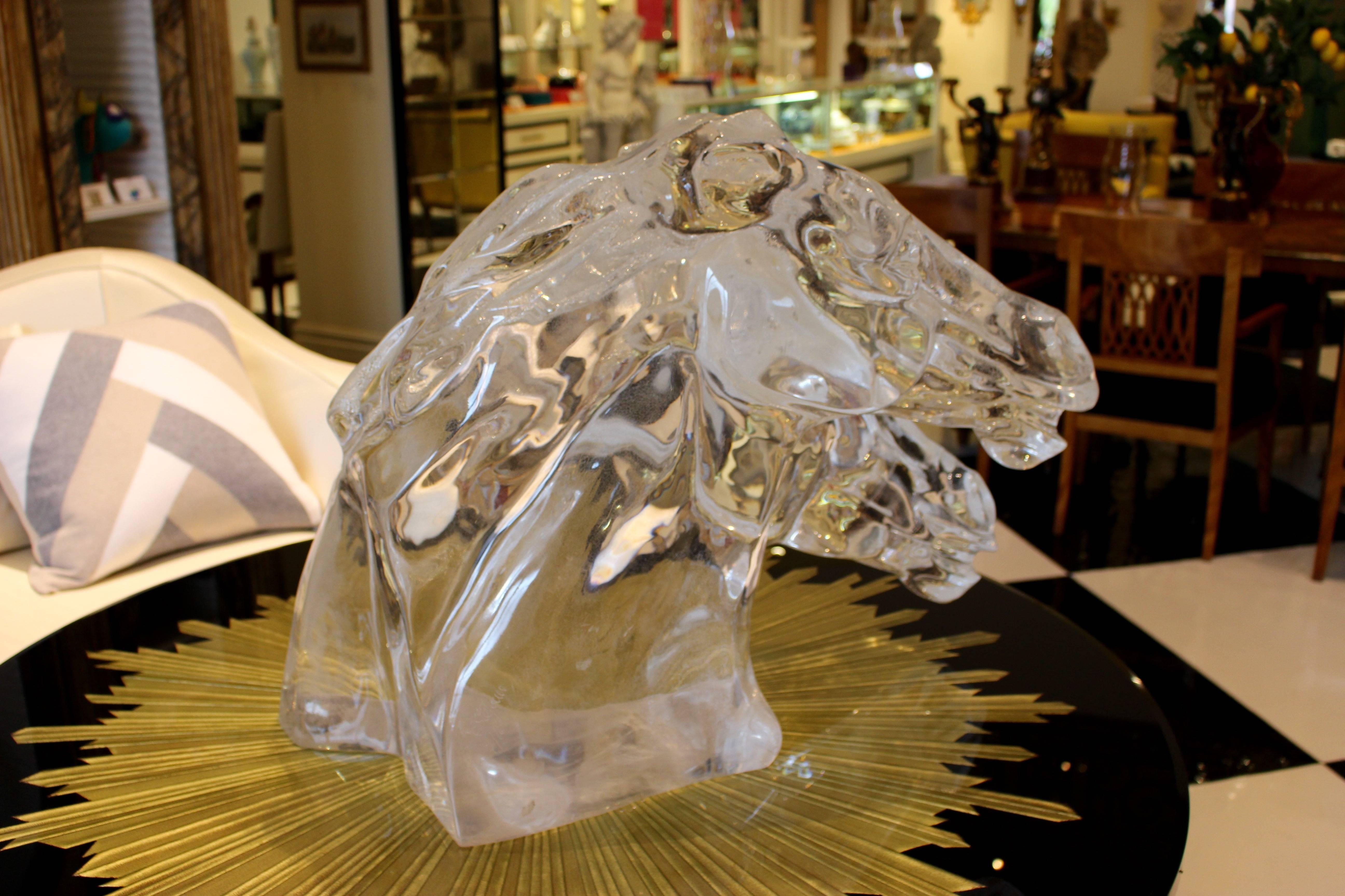 A 1970 Lucite double horse head sculpture signed by the Italian artist Deste Jomco. This impressive sculpture depicts two unbridled horse heads, side by side with flowing manes, one overhanging the other with the mouth slightly open, as if