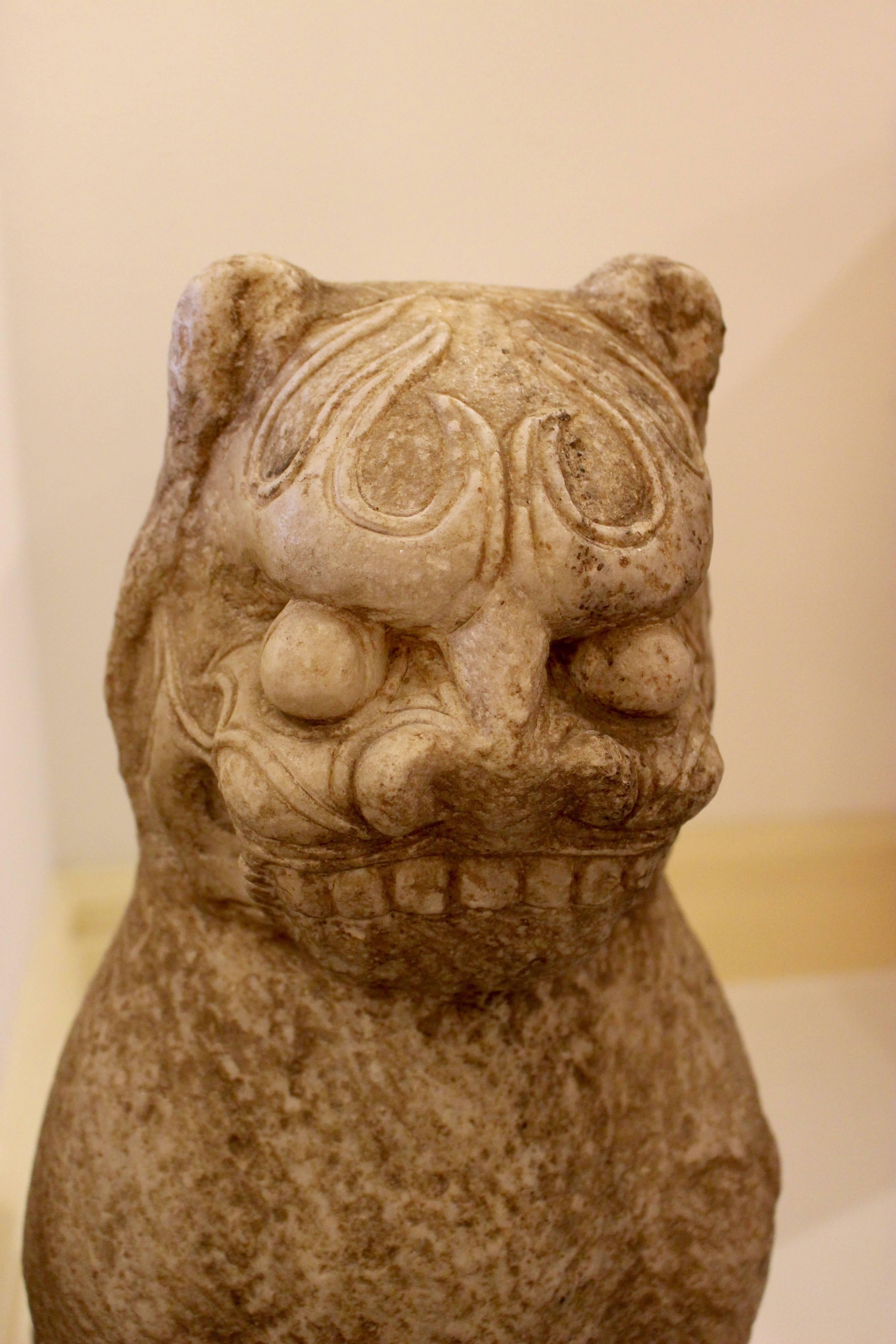 Hand-Carved Pair of Chinese Buddhist Carved Stone Guardian Lions from the Ming Dynasty