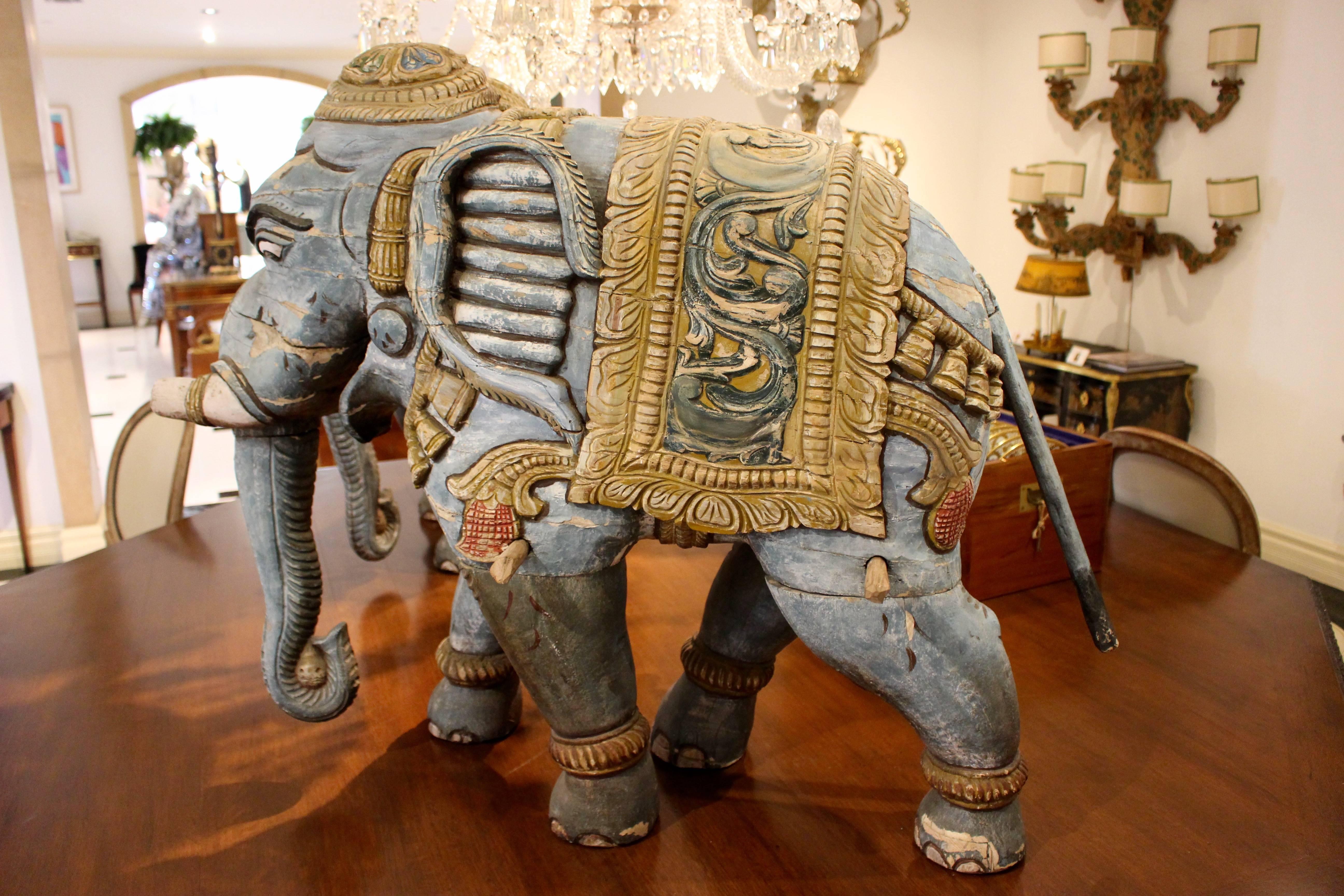 20th Century Pair of Parading Polychrome Carved Wood Striding Elephant Sculptures