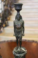 Pair of 19th Century Green Marble Egyptian Style Candlesticks with God Figure