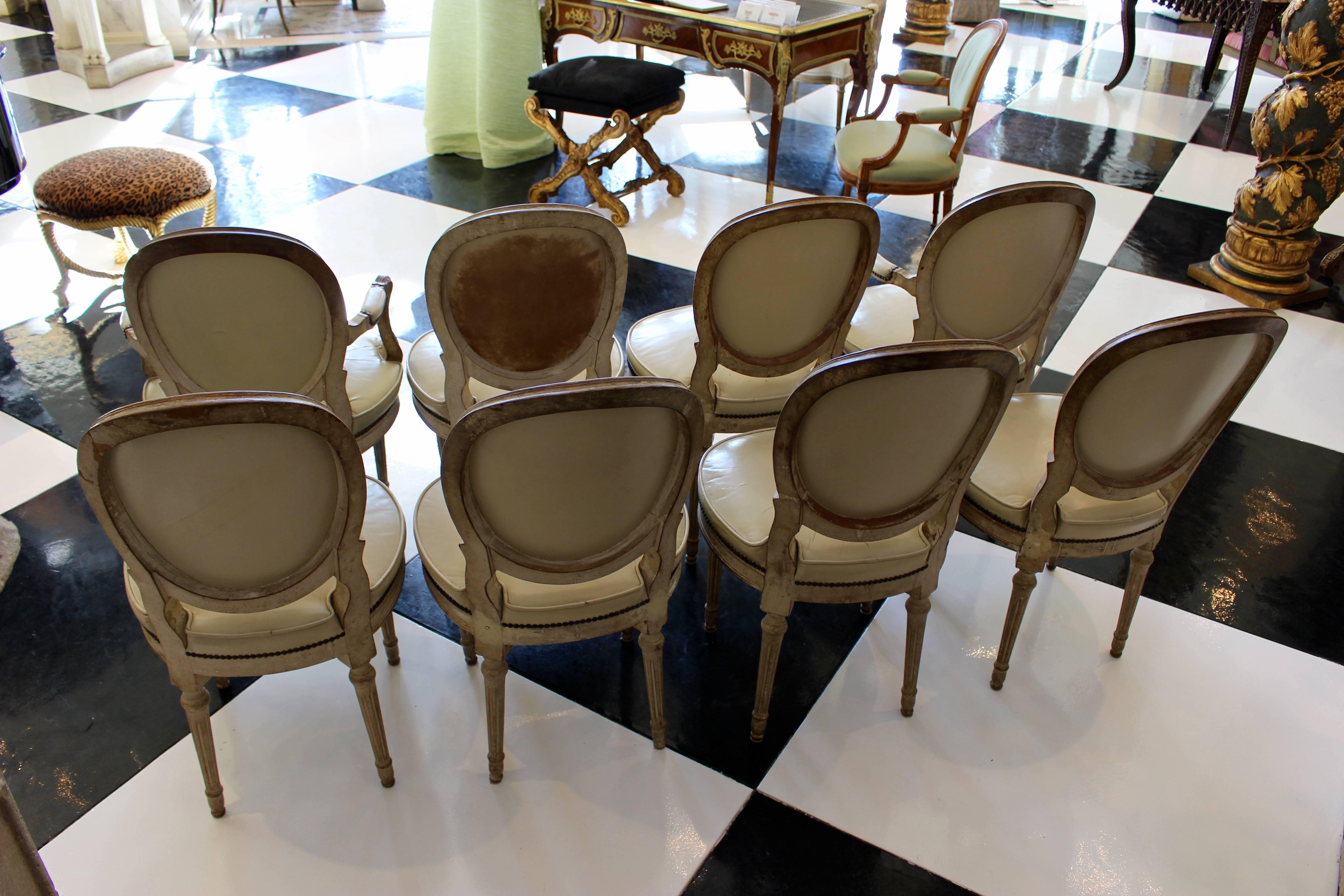 Carved Set of Eight French Late Louis XVI Style Dining Chairs with Leather Upholstery
