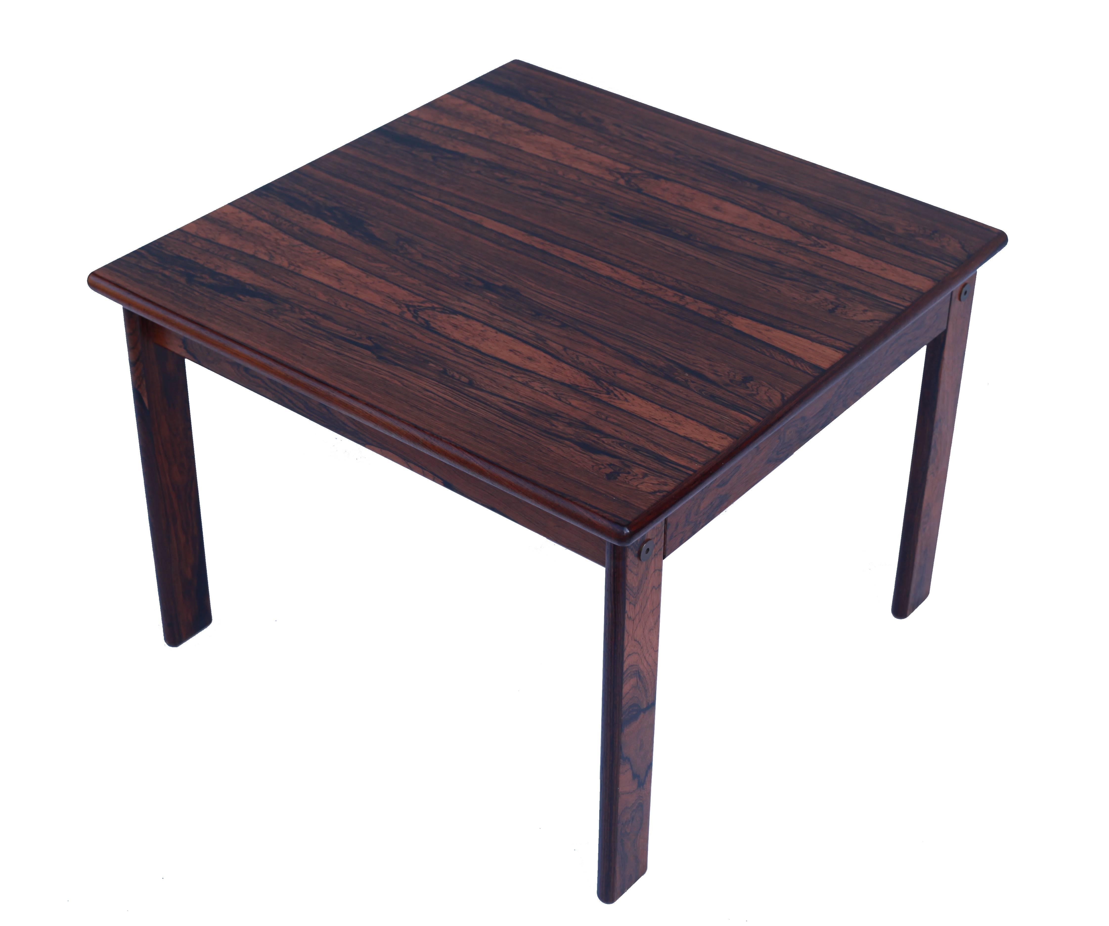 This stunning palisander table crafted in Finland can be used as a side table or possibly a coffee table.