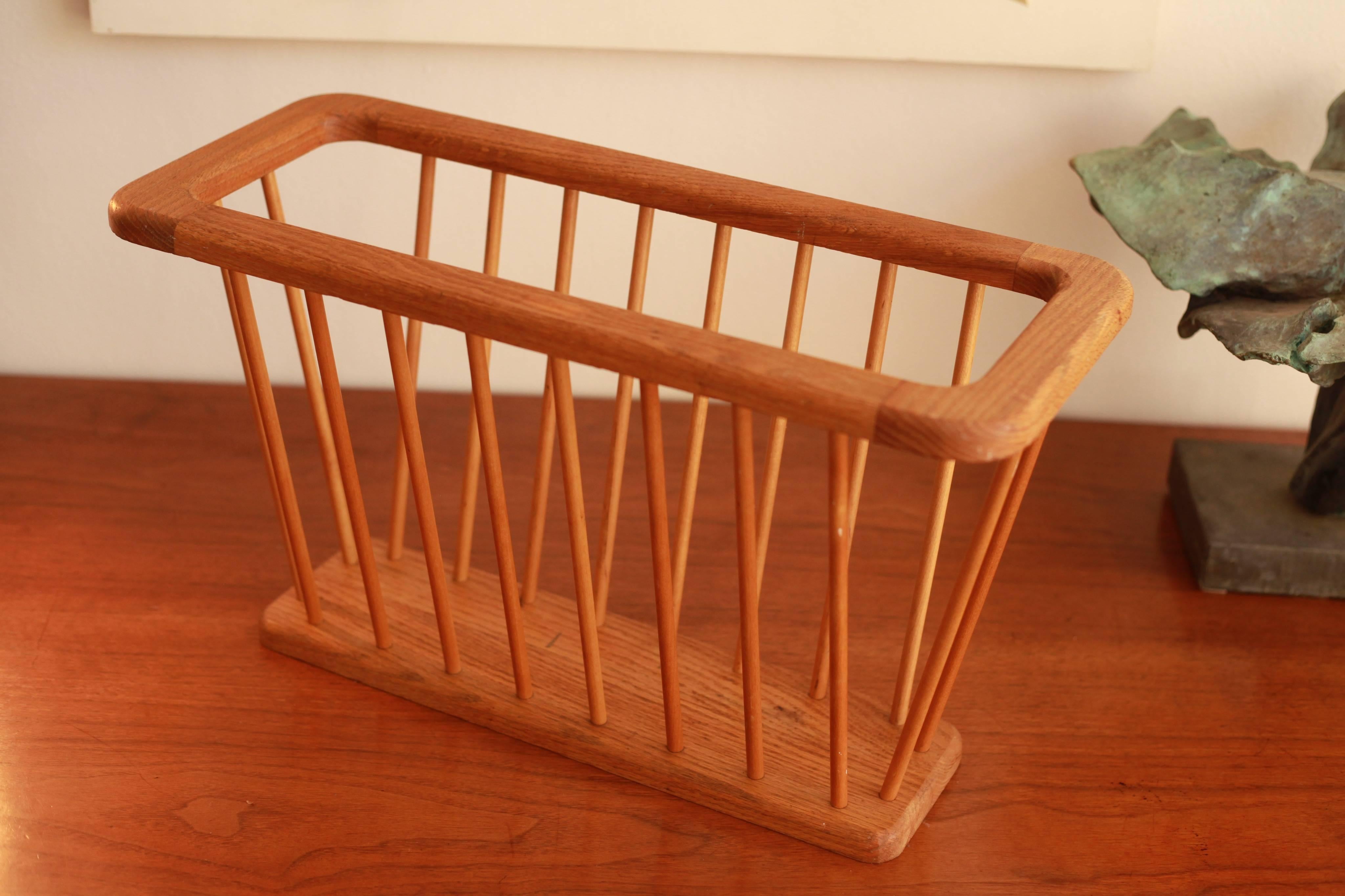 Danish Modern magazine holder constructed with 20 solid oak spindles.