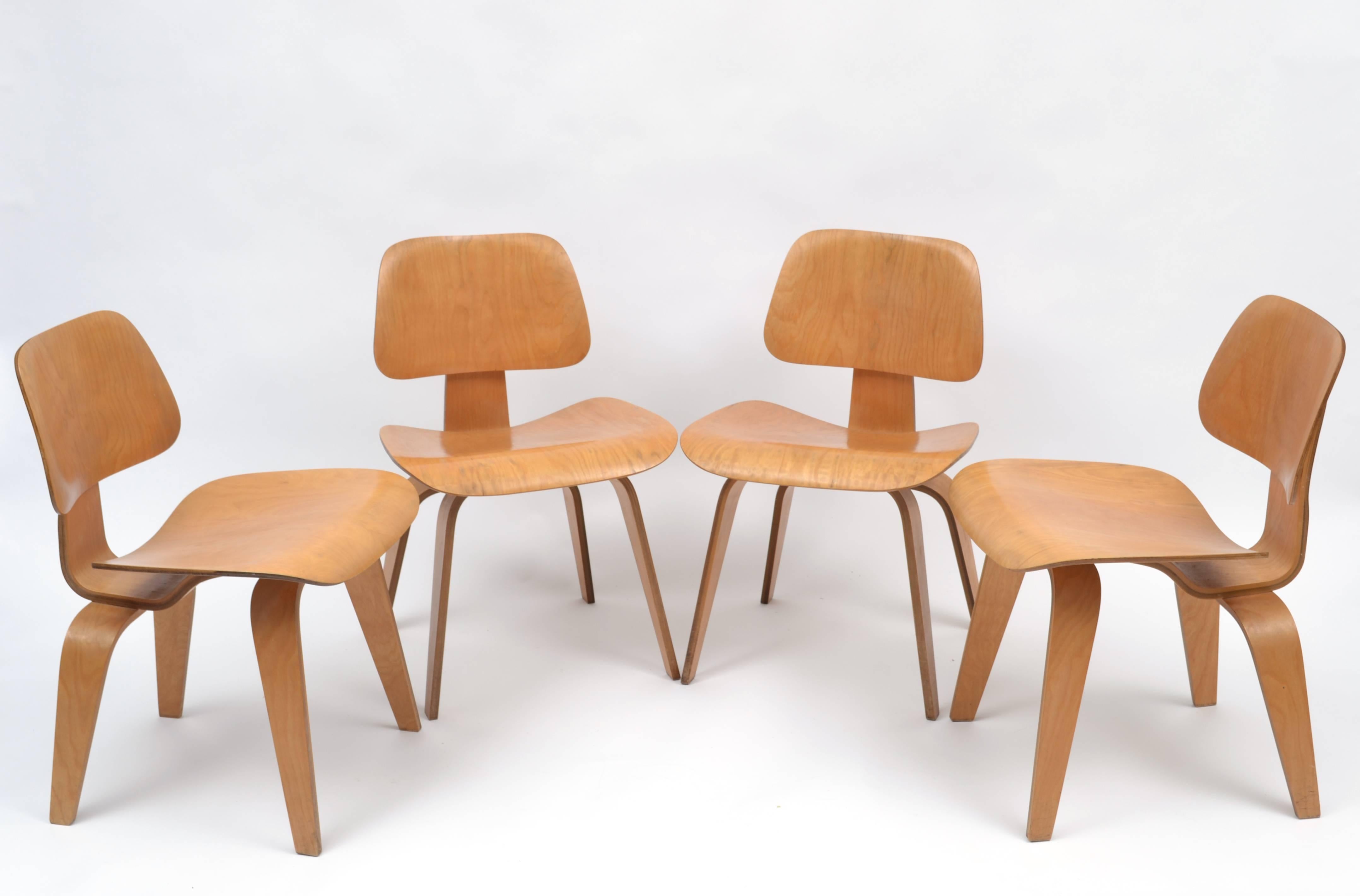Rare matching Birch Eames DTW-1 (Dining Table Wood) and four DCW's (Dining Chair Wood). The set is all original and in remarkable condition considering it was used daily since it's purchase by the original owner's in the late 1940s. This is a great