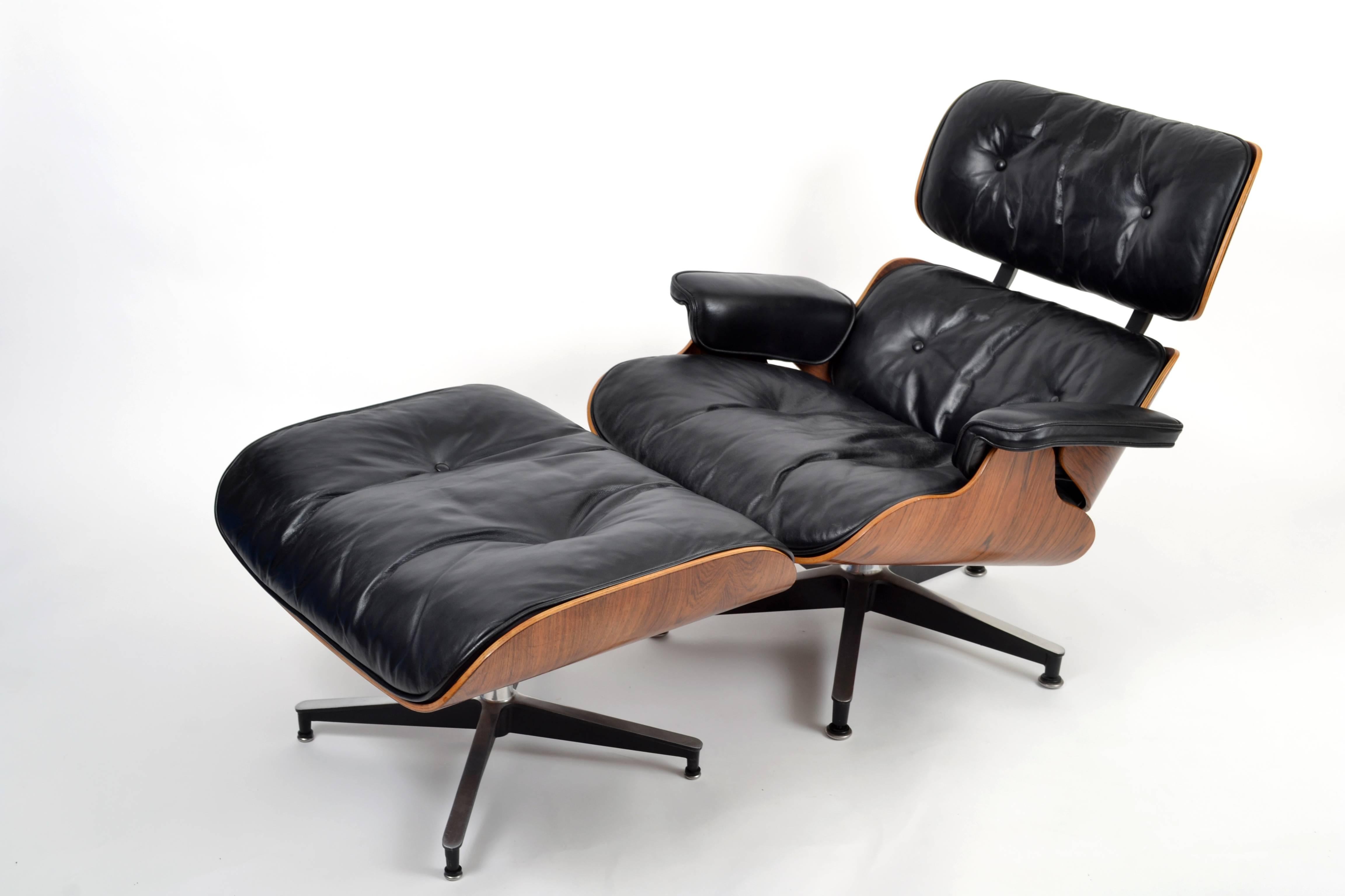 Mid-20th Century 1960s Herman Miller Rosewood Lounge and Ottoman by Charles and Ray Eames