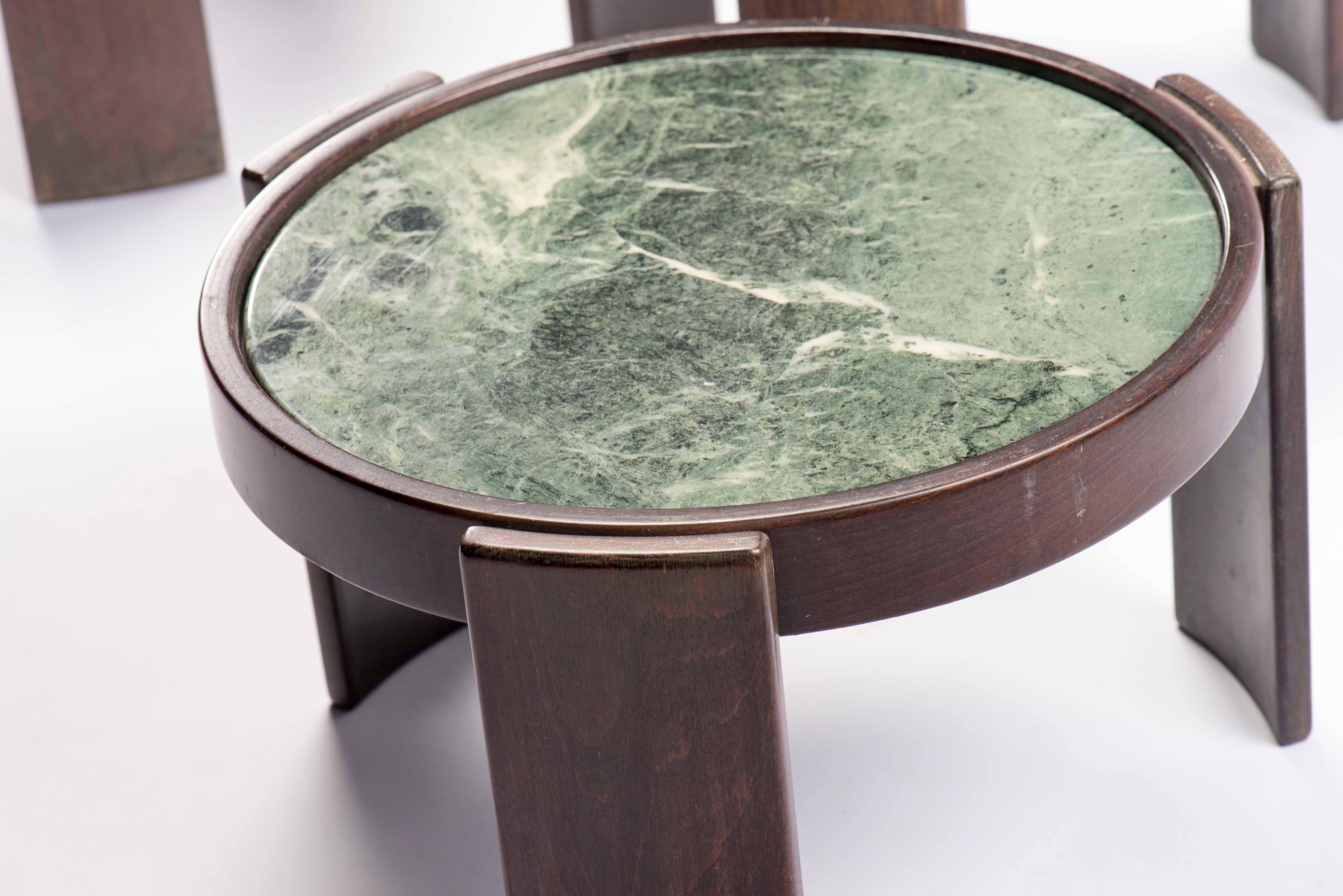 An amazing set of vintage Frattini stacking side tables with rare custom green marble tops. These tables were part of the original decor of a Marcel Breuer designed home.