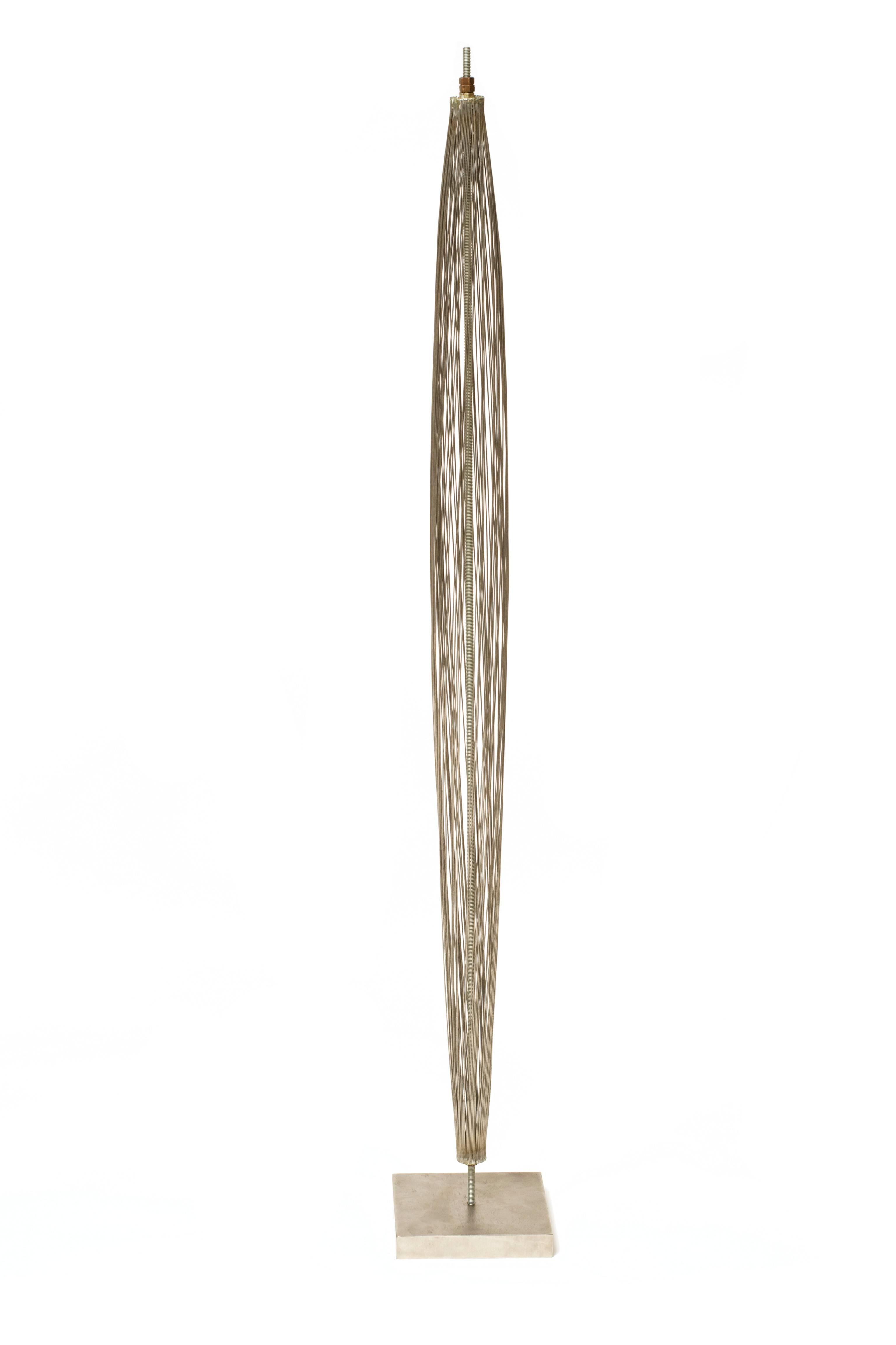 This remarkable piece consisting of 68 expandable stainless wires offers a glimpse into the genius of Harry Bertoia’s design process. This early design wire form sculpture, made by Harry Bertoia in the 1950s, would be refined years later as the