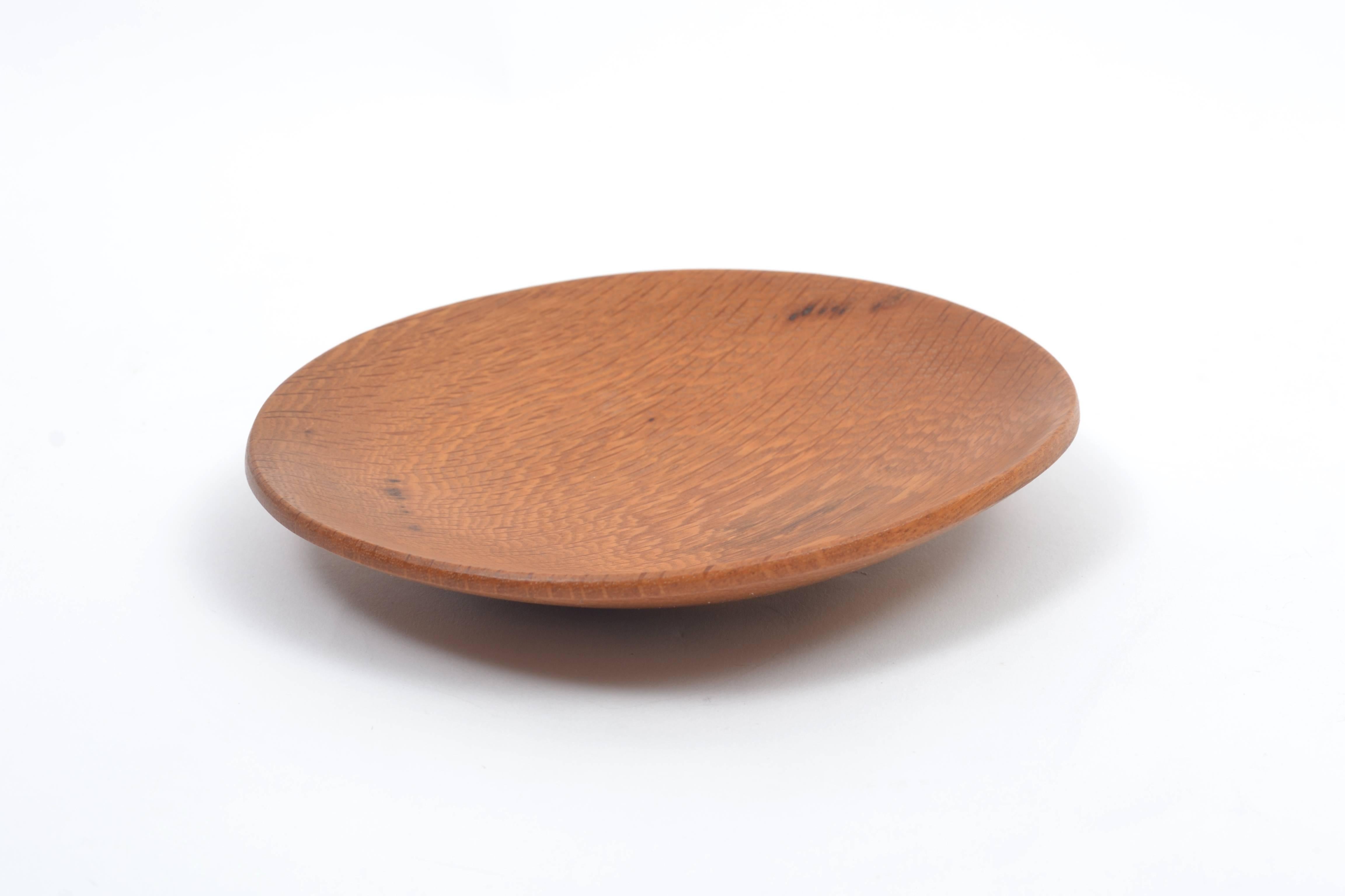 This wonderful bowl was crafted from a large oak tree that rested between the guest house and main home of famed architect Frank Lloyd Wright's falling water. Upon concern that the oak may fall on the guest house, it was removed and woodworker