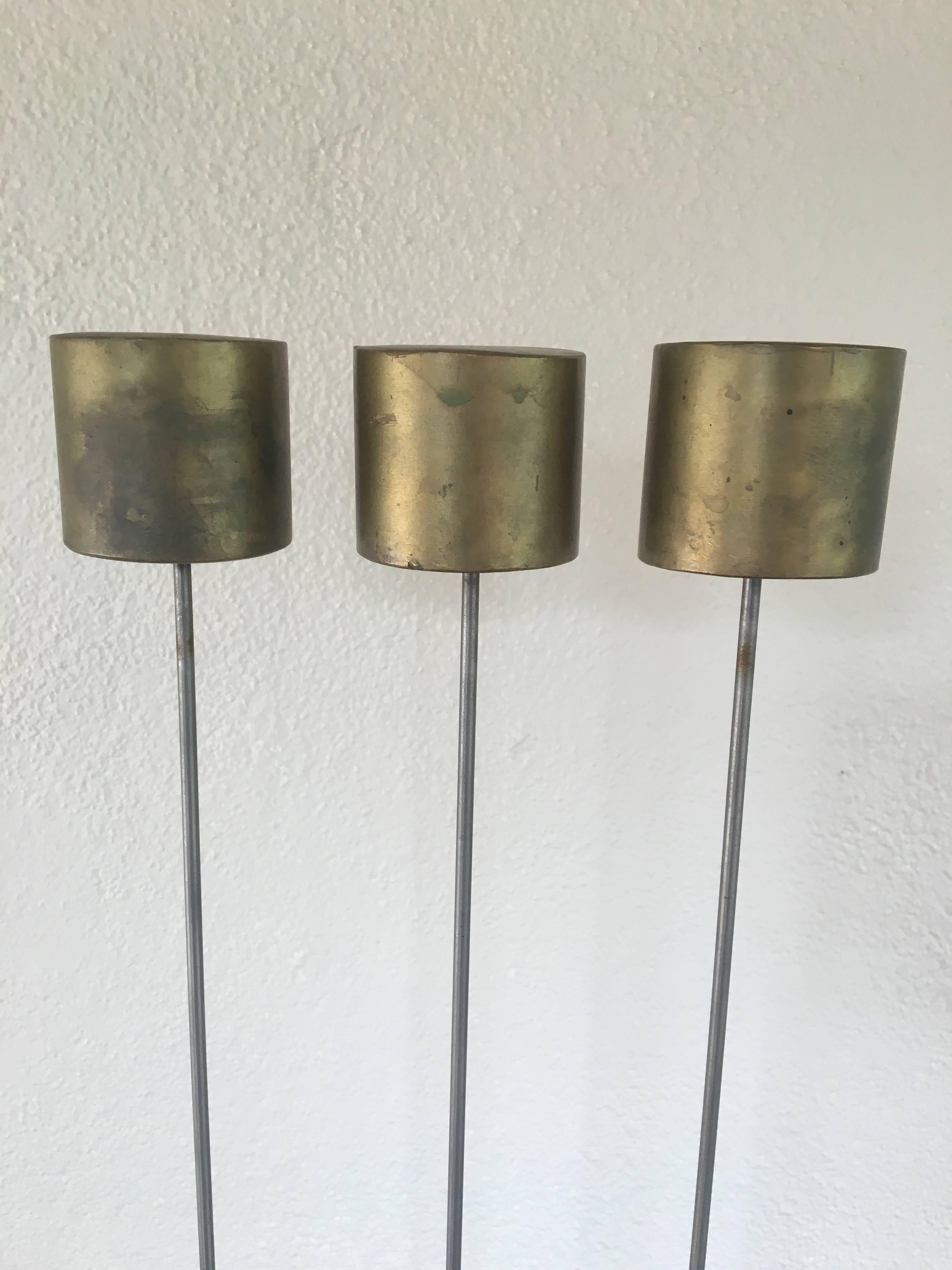 Three rod sonambient sound sculpture by the son of Harry Bertoia. The large tops produced a deep sound. Beautiful patina. Signed and certificate of authenticity from the Bertoia studio available.