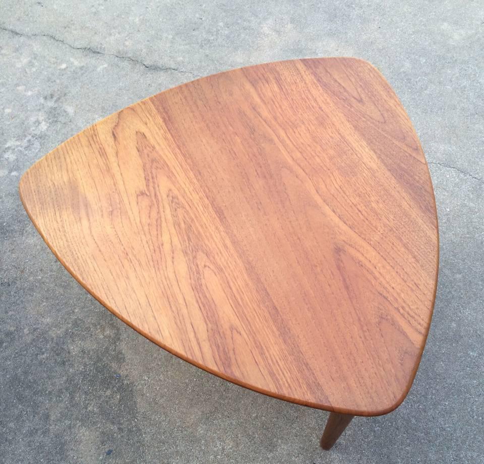Side table constructed of teak and designed by Fredrik Kayser.
