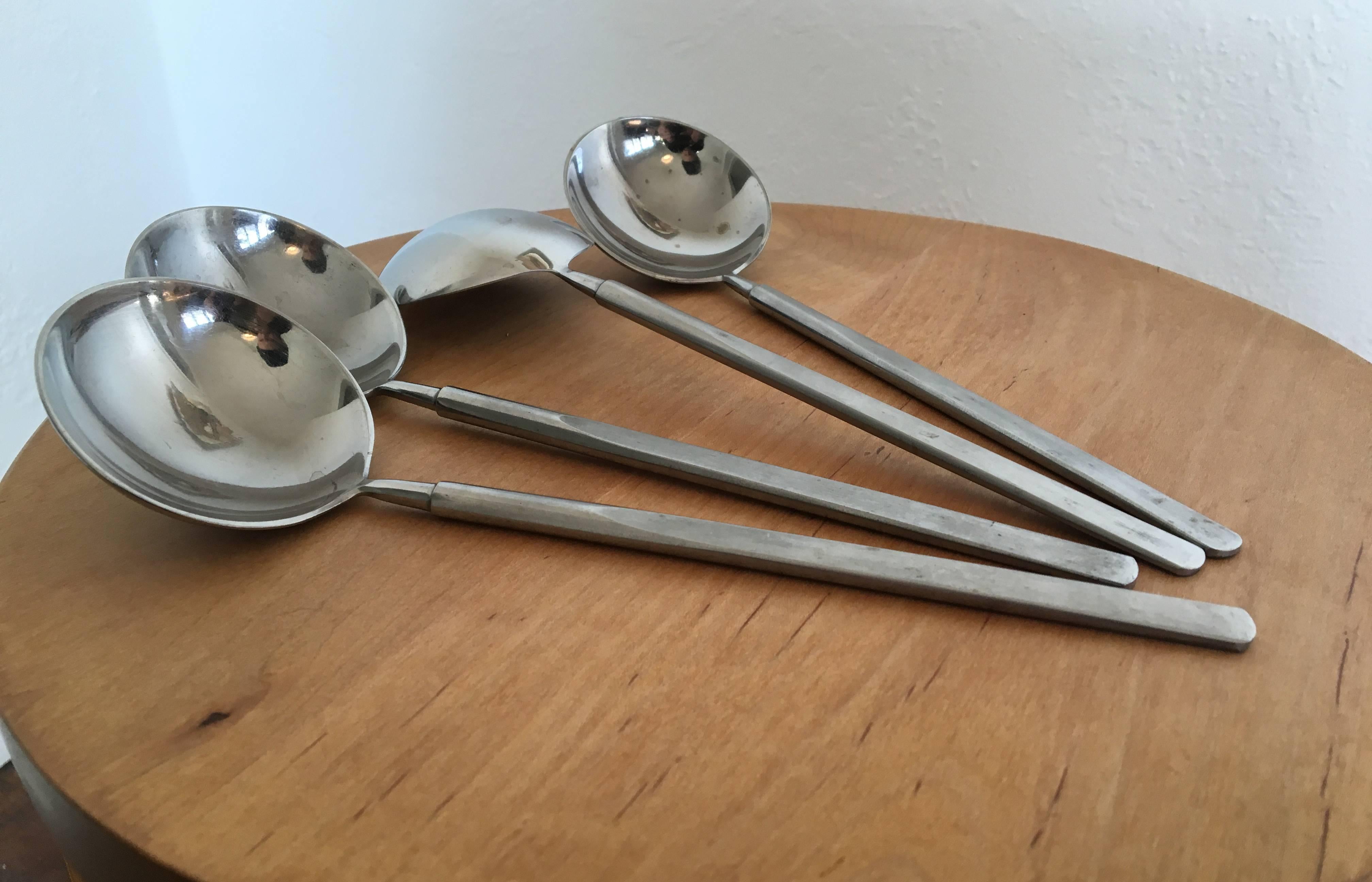 Set of four rare serving spoons in the Obelisk patter by Erik Herlow for Copenhagen Cutlery.