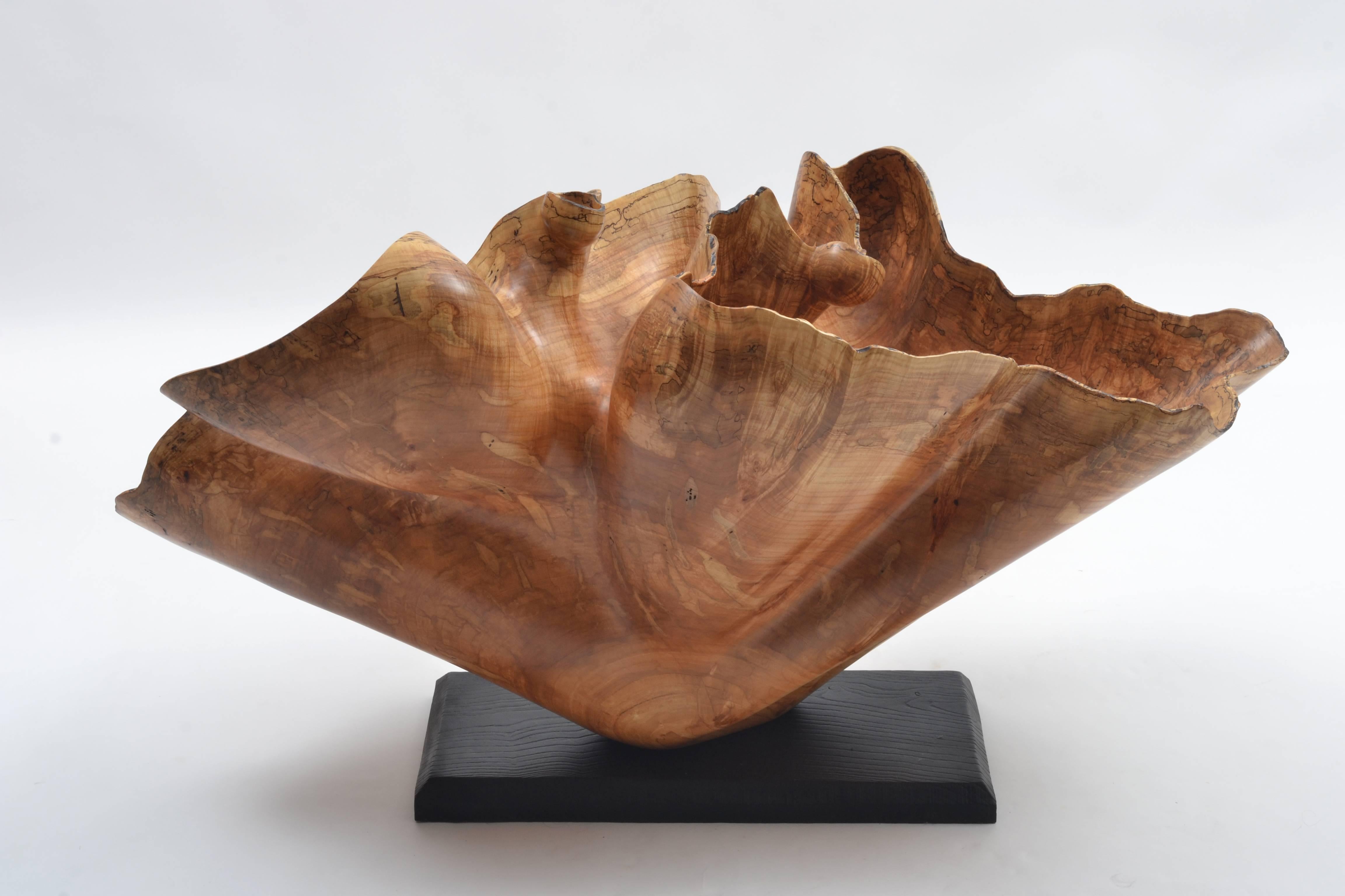 A massive, remarkable masterpiece by renowned wood sculptor Brad Sells. The work of Brad Sells can be found in the Smithsonian Institute, major museums and in both corporate and private collections. Sells has been featured in the PBS series 