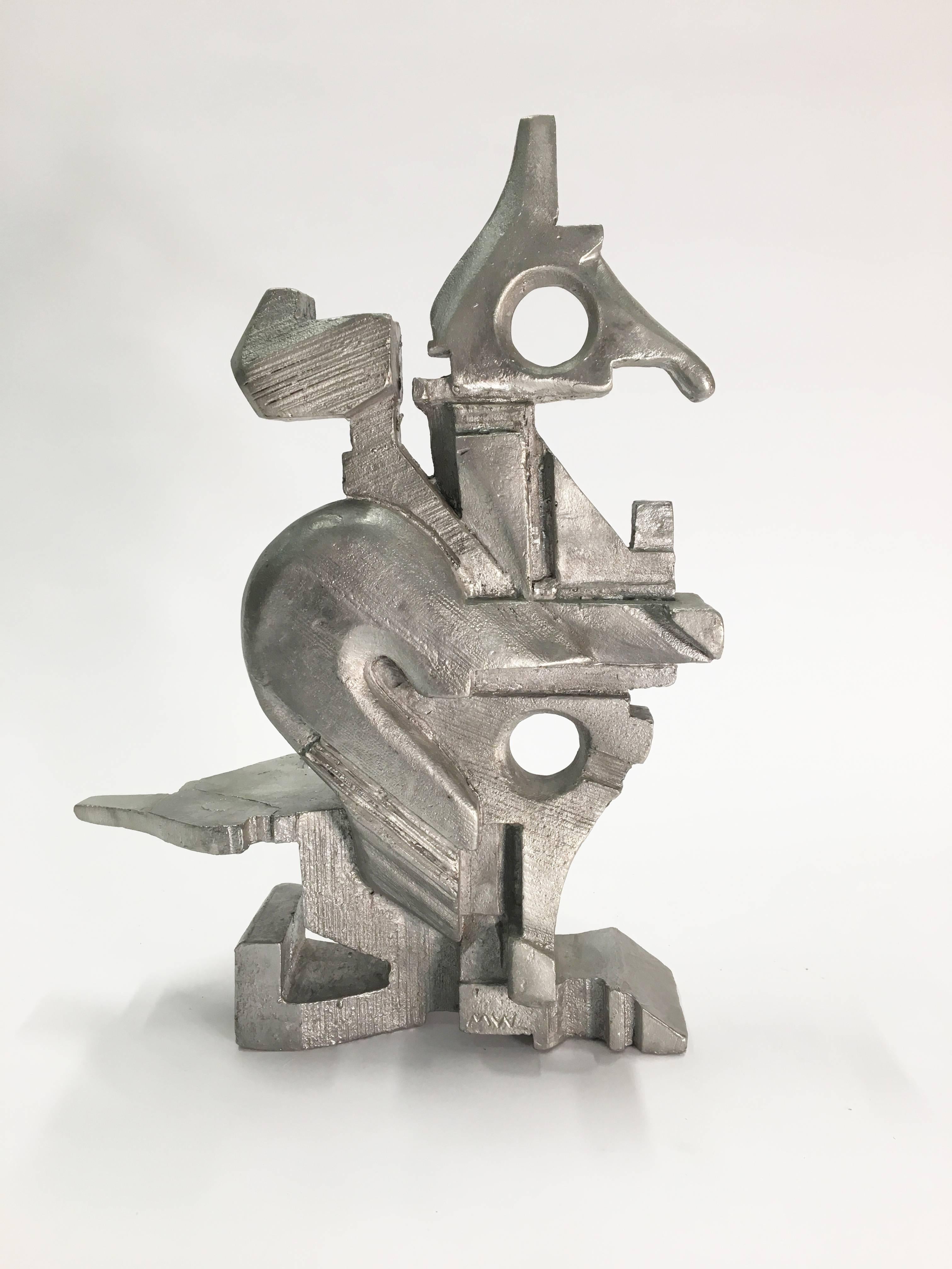 Beautiful tabletop sculpture cast out of aluminum by artist Michael Walsh.

Michael Walsh has been exhibiting extensively throughout North America and Europe since 1994. His work has been featured at the Carnegie Museum of Art, National