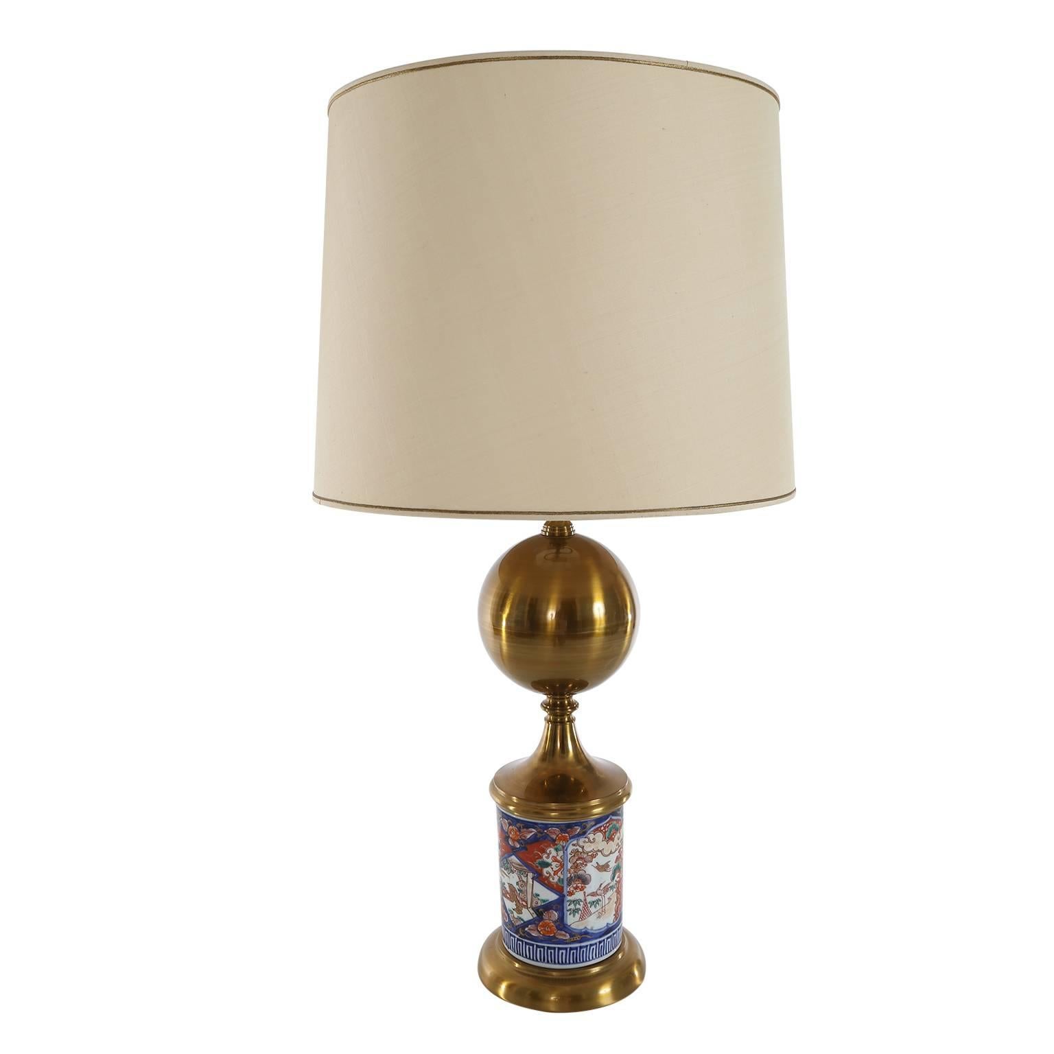 Pair of Midcentury table lamps with a porcelain base in Chinese decor in cobalt blue and saffron on white subfont.