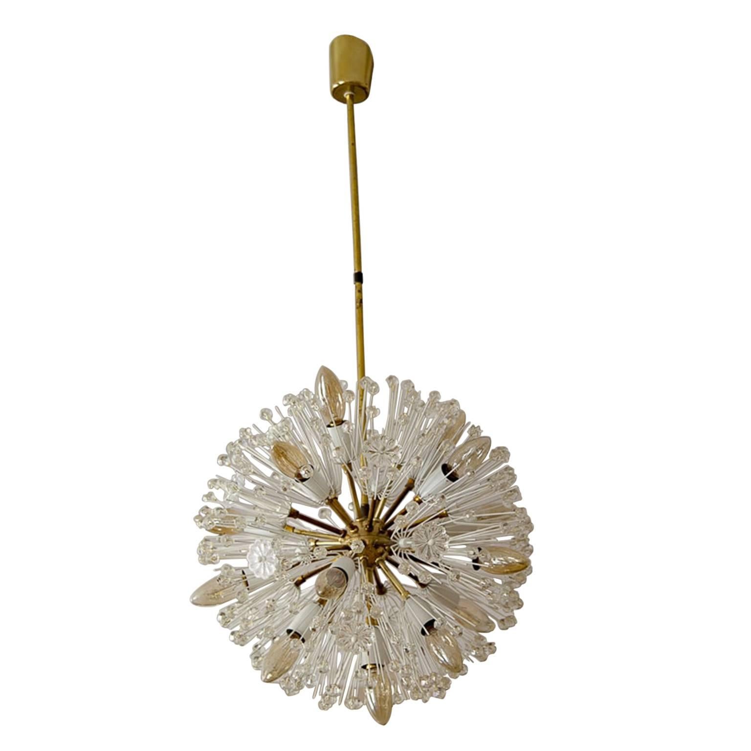 Large Sputnik chandelier, in glass, crystal and brass by Emil Stejnar for Rupert Nikoll. This glamorous large brass chandelier is also known as ‘Pusteblume,' or ‘Snowflake' and is made in Vienna around Mid-Century, this magnificent sputnik