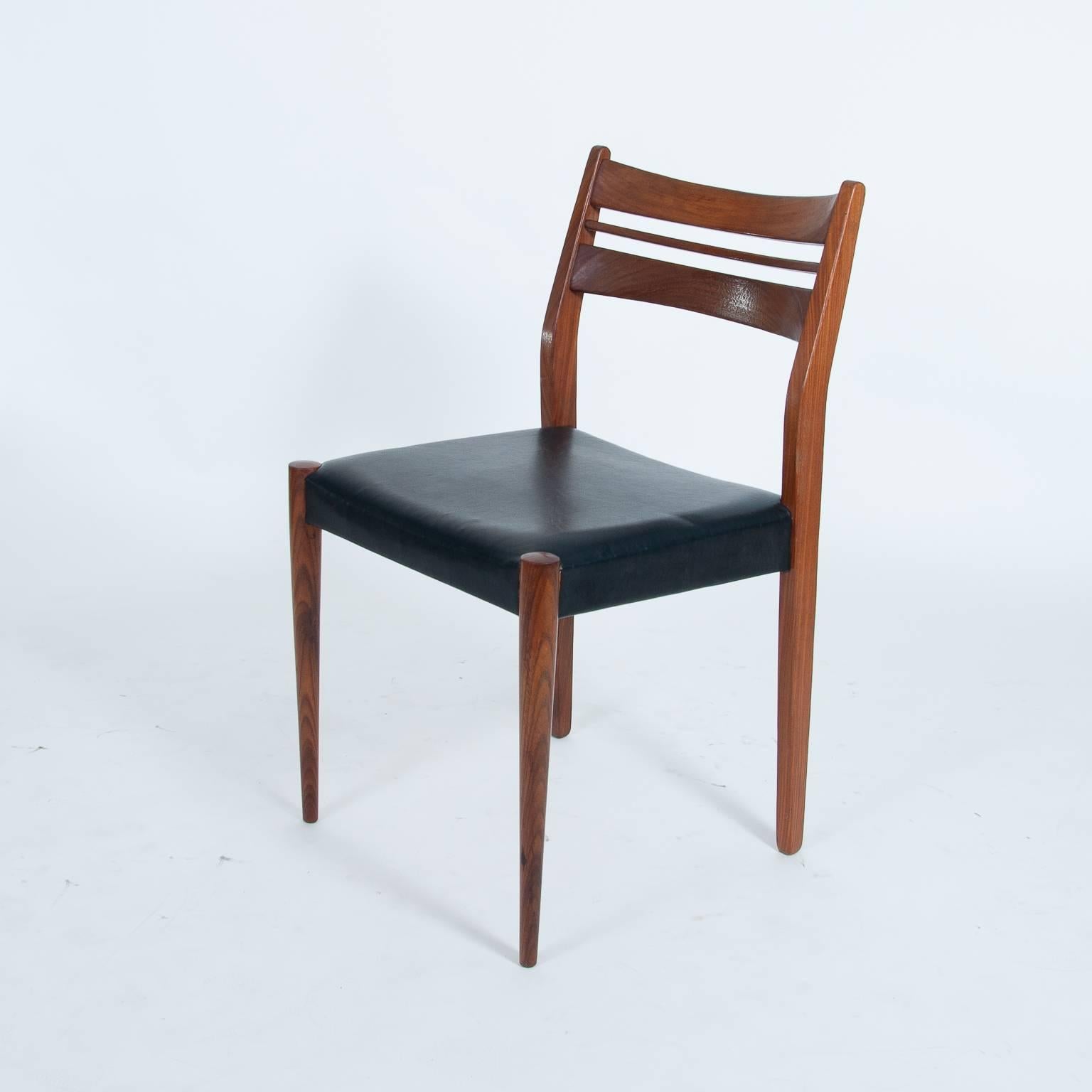A set of four dining chairs by Arne Vodder, Denmark, 1960s
The originally wood plate of the chairs was changed.