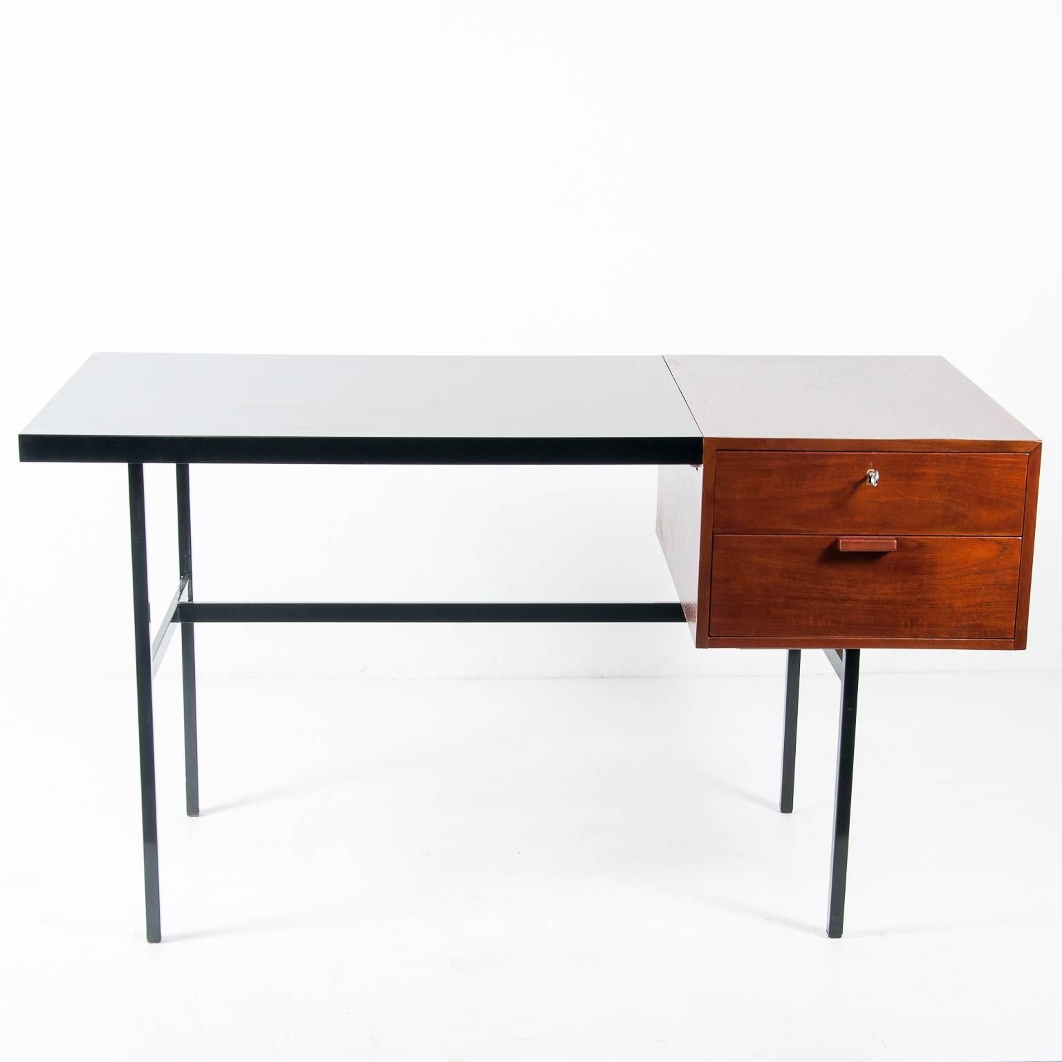 Designed by Pierre Paulin, circa 1930. 
In the style of the Bauhaus era.
Manufactured by Thonet. Lable under the tabletop.
Walnut chest and drawers, black lacquered tabletop.
Black lacquered steel frame. 
Perfect condition. 
A very rare to find