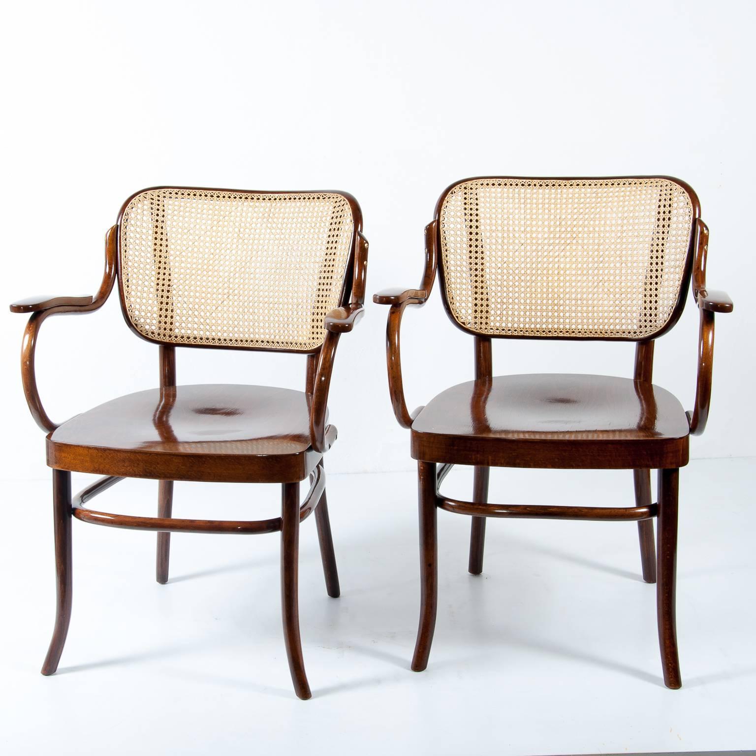 Designed by Gustav Adolf Schneck and Entwurfsbüro Thonet-Mundus Wien, before 1931.
Manufactured by Thonet, documented by label and stamp.
Beech bendwood.
Wickerwork recently renewed and surfaces polished.
Perfect condition.
Beautiful armchairs with