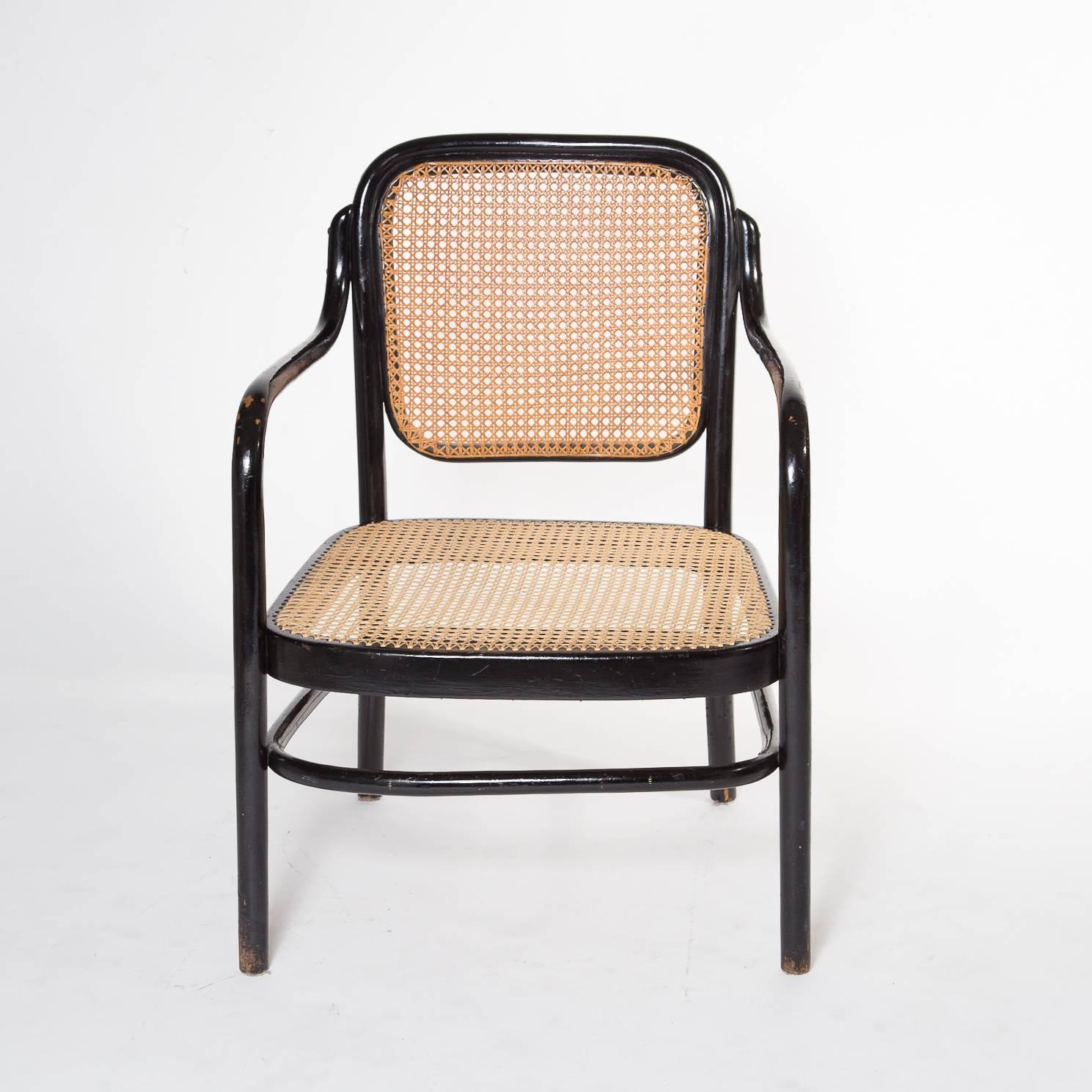 A very rare set of two Thonet Adolf Schneck A61 bentwood low chairs.
The chairs are produced in Austria circa 1925 and are in original condition.
The wooden frame is lacquered in black with a nice patina.
The Wickerwork is renewed.

 