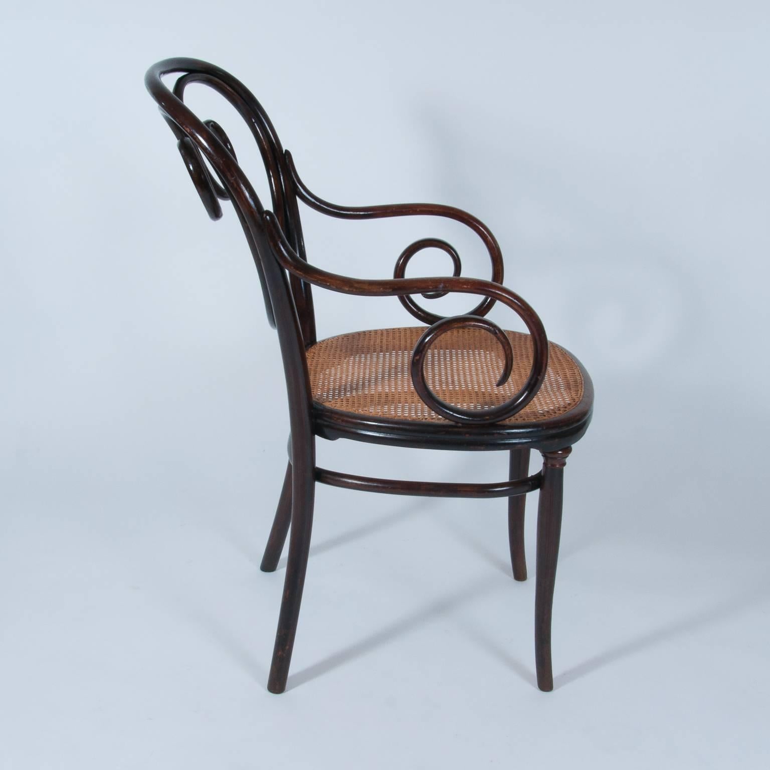 Antique Thonet Bentwood Armchair Fauteuil No. 2, designed 1865, manufactured 1895.
An extraordinary piece of furniture; Armchair, show piece, side chair or even dining chair.
Very majestic.
One of very the hard to find Thonet model no. 2.
In